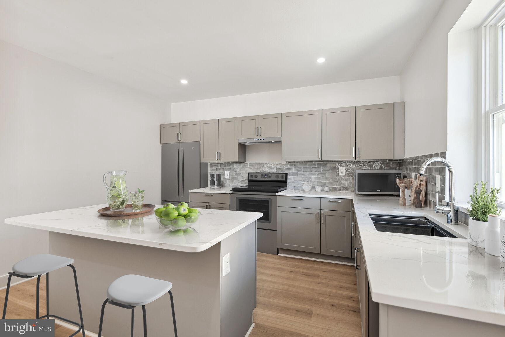 Nestled in the vibrant heart of Baltimore, 500 S Haven St has been beautifully renovated inside and out. The kitchen has quartz countertops and plenty of cabinets for storage. Recessed lighting and all new flooring have been installed throughout the home. Enjoy the luxury of each bedroom having its own full bathroom and plenty of space. This property also features a fully finished basement with a washer and dryer! Just a short walk to volley ball courts, tennis courts, shopping, grocery stores, and more. Secure your lease now! Vouchers accepted.
