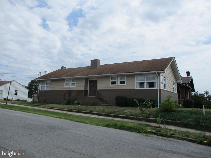 Gorgeous Brick and Siding Rancher with 3 bedrooms, 2 baths, living room, kitchen, dining room and family room. This home was totally rehabbed in 2017 with fresh paint, new appliances and new HVAC  and new hot water heater.  Huge oversized 20x20 2 car detached garage and nice yard 42 inch kitchen cabinets and tile back splash.  Finished basement is not conditioned but has a wood stove.  New foundation drain system with sump pump.  Located just minutes from I81, The Foxcroft Towne Center, War Memorial Park, Historic Martinsburg, shopping and restaurants.  Very Desirable Neighborhood.