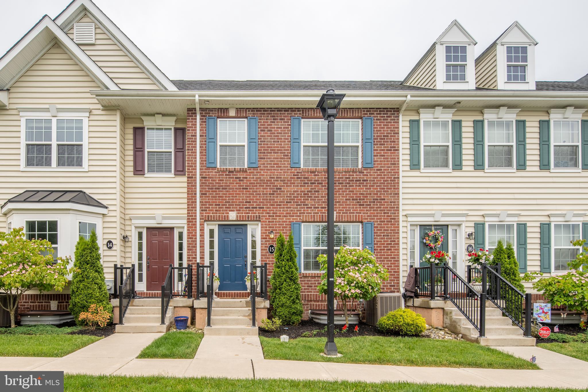 Discover this stunning 3-bedroom, 2.5-bathroom home in the prestigious Overlook at Carriage Hill development in Doylestown, located in the award-winning Central Bucks School District. Situated in a private corner of the development with open views, this home offers plenty of parking and a serene, uncrowded environment. The main floor features gorgeous hardwood flooring, high ceilings, an upgraded half bathroom, a spacious living room with a corner gas fireplace, a dining room, and a gourmet kitchen with granite countertops, pendant lighting, a glass mosaic backsplash, a separate pantry, and a center island. Upstairs, the recently updated full bathroom, a spacious second bedroom, and the master suite with a large bedroom, walk-in closet, and full bathroom with double vanity and a two-person tiled shower await. The third floor houses a huge third bedroom. The fully finished basement includes a family room, a separate laundry room, and a storage area with recessed lighting. Conveniently located minutes from Doylestown's shopping, restaurants, and museums, with easy access to Routes 202, 611, and 313, this home offers both luxury and convenience.