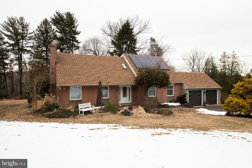 This mid-century home is a one-of-a-kind charmer situated in the heart of Meadowbrook. The property features a partially wooded, near-acre lot that slopes gently toward the Meadowbrook train station, which is accessible via a gorgeous, private wooded path in the backyard. This prime location even offers direct commuter lines to the airport daily.
Both the front and back of the home overlook serene wooded areas, providing a sense of seclusion and natural beauty. The open layout includes a spacious glass-enclosed porch that offers a picturesque view of the backyard, as well as a small attached back deck for outdoor enjoyment. Inside, you will find hardwood floors throughout, a master bedroom with its own heating gas fireplace, and a sun-drenched office.
This home is designed for convenience and organization, offering an abundance of storage options including a large dedicated storage area and additional space above the garage. For those with multiple vehicles, the property includes a substantial two-plus car garage and a wide, two-plus lane driveway that provides ample space for easy turnarounds to face the street. Additional modern features include solar panels, a tankless hot water heater, and heated bathroom floors. With its mature landscaping and well-maintained grounds, this home is a true treasure for anyone seeking a peaceful and functional retreat.