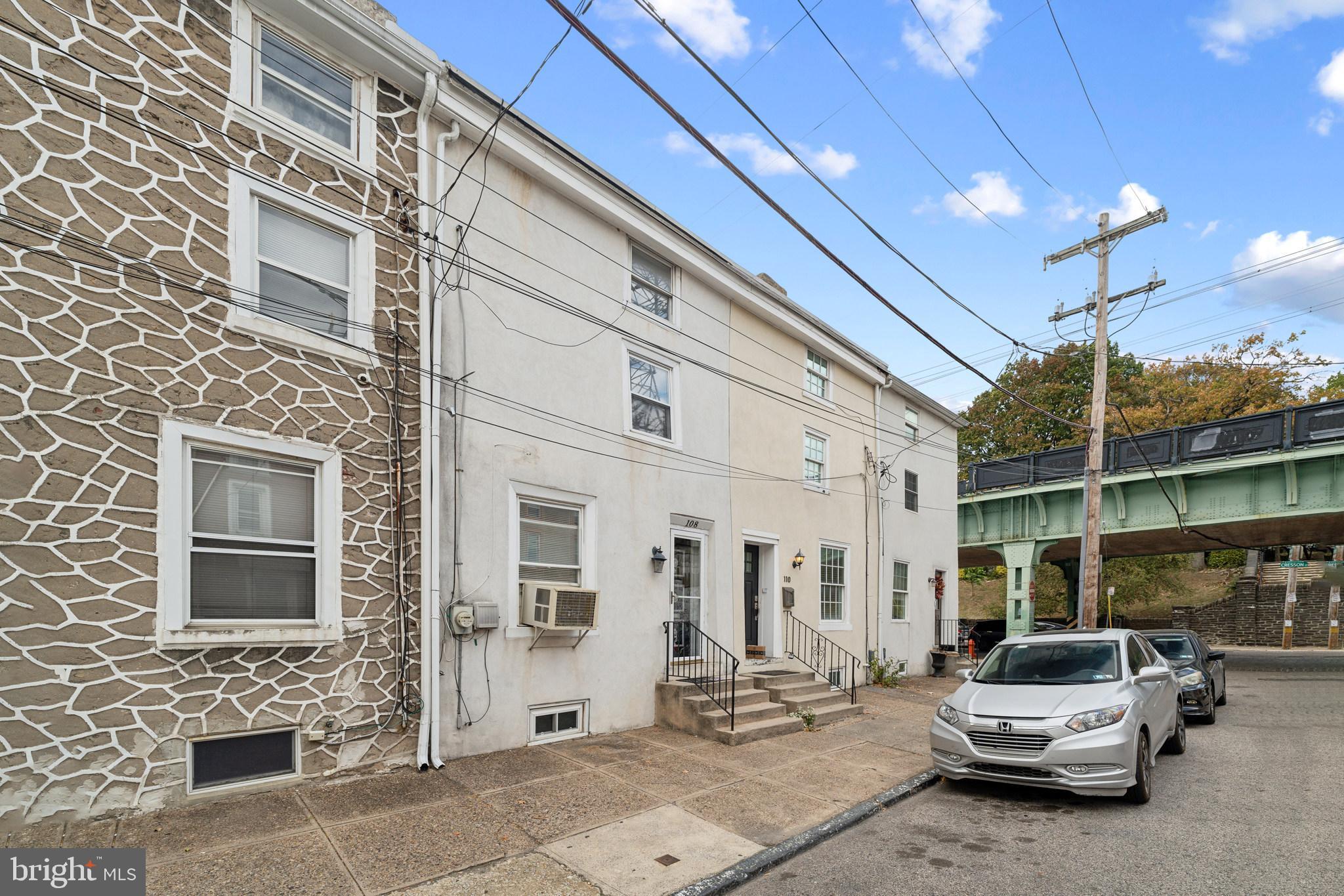 Welcome to 108 Roxborough Ave, a beautifully maintained rowhome in the heart of Manayunk! The main floor of this home features the large living room, eat-in kitchen, laundry area and a full sized bathroom. Past the laundry you'll find the door to your private, fenced-in back patio. The second & third levels of this home boast 5 generously-sized bedrooms, which makes it perfect for anyone looking to capitalize on extra space. The basement is also great for additional storage. This prime location puts you within walking distance of the Schuylkill River Trail, Pretzel Park and all of the amazing amenities and resources that Main Street Manayunk has to offer-including the famous Ryan’s Pub which is just 3 doors down! It is the perfect opportunity for prime city living with the convenience of always being close to nature. Whether you drive or prefer public transit– this location features ample opportunity for on-street parking, and is steps away from public transportation that can take you directly downtown and anywhere else in the Greater Philadelphia area. Don’t miss your chance to own a home in this amazing, historic neighborhood! Schedule your tour today!