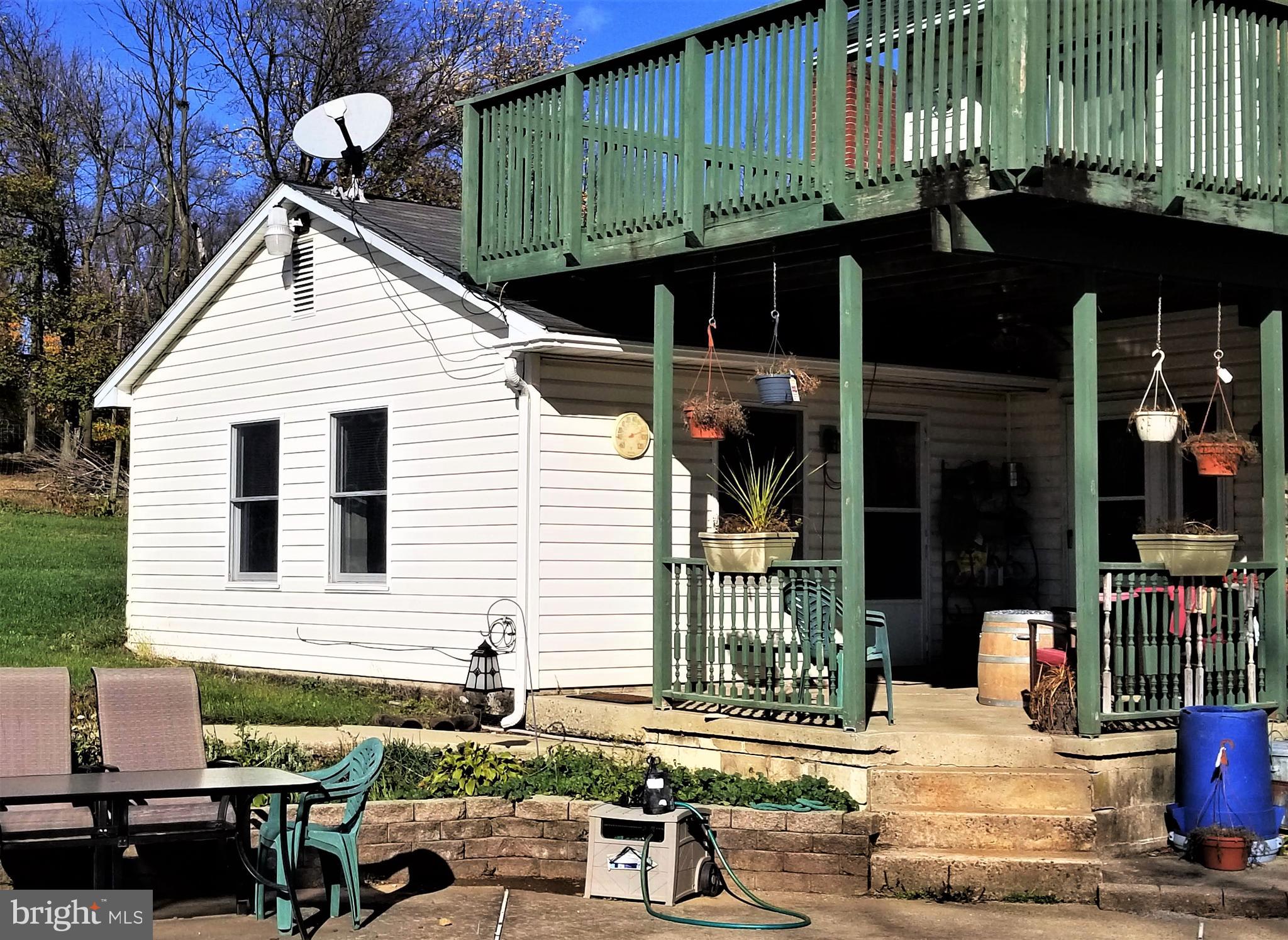 Enjoy the Panoramic Country views from your Deck at this updated and comfortable 1BR country apartment on 22+ acres. All new flooring throughout. Ranch style 1 floor living attached to a Stone Farmhouse. Heat and Electricity are included in the rent price making this a very affordable living arrangement. There is a refrigerator in the Kitchen, and laundry hookups available for your convenience. Landlord takes care of Lawn care and Snow Removal. There is availability for 1 full bay of the oversized garage for an additional $100 per month. Rural setting located 5-10 minutes from shopping, restaurants and entertainment. Call to set your appointment today and be in before the holidays!