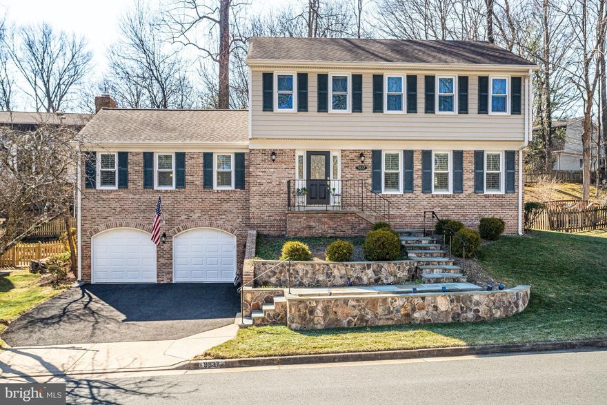 This stunning home has been beautifully renovated and meticulously maintained. The lovely stone hardscape and slate walkway welcome you as you approach the entrance to this charming property. The main level offers beautifully refinished light oak hardwood floors and includes a large Gourmet Kitchen with 42" cabinets, built-in microwave, five-burner gas stove, Quartz (Caesarstone) countertops, recessed & under-cabinet lighting, large Pantry, Breakfast Nook and Butler's Pantry. The Kitchen opens to a fabulous Great Room (expanded from the original family room) with a hi-efficiency gas fireplace, built-in bookcases, plantation shutters, and a sliding glass door (with motorized UV protected shades) leading to the lovely, fenced backyard with a 400 sf maintenance free deck (2022) with built-in seating and accent lighting under the railing. The open flowing floor plan make this the perfect place to relax, entertain or spend time with family and friends.  Additionally, there is a formal Living Room (with plantation shutters) and Dining Room (with UV and light filtering shades) both with crown molding.  Other rooms include a main level half bath and a separate Laundry Room with utility sink.
The upper level features plush carpet and four spacious bedrooms, each with ceiling fans. The Primary Bedroom has huge walk-in closet, and an adjoining Primary Bathroom with two separate vanities.  There is also a second full bathroom with dual sinks on this level.
The lower level includes a Rec Room with wet bar, 9' ceilings, a 3rd full bathroom (with shower, ceramic tile and pedestal sink), a large storage room and a mudroom/foyer with a 2nd refrigerator and door leading to the oversized two car garage with additional storage space. Other updates to this home include a new high efficiency gas furnace, new AC (2024), windows (2021), hot water heater (2022) and new driveway (2024). 

Burke Centre is a sought-after community and offers countless amenities such as five community pools, six community centers, over 30 miles of miles of trails, pickleball/ tennis/basketball courts, baseball field, six ponds, playgrounds, and great shopping and restaurants. The home is ideally located close to commuter routes, VRE and Metrobus stops.  This Berry-built "Bayberry" model is one of the largest homes in Burke Centre and is move-in ready!