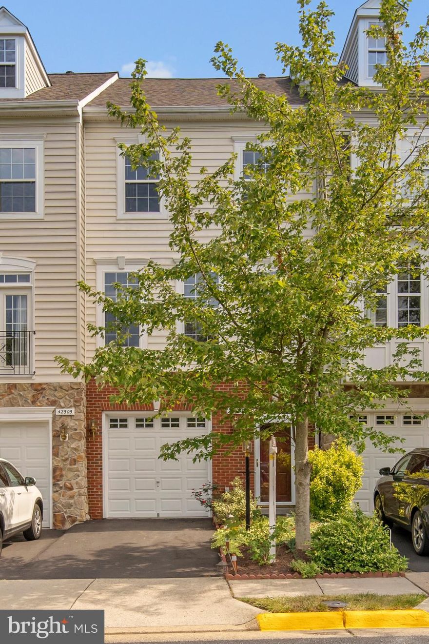 ****OFFERS DUE BY 8/9, MONDAY at 5PM.****Stunning 3-level townhome located in the heart of Brambleton. This home offers 3 large bedrooms and 2.5 baths. Custom trims in the house include extensive crown molding throughout entire home. Gleaming Brazilian Cherry hardwood floors on main and upper level.   This home features a spacious open kitchen/dining area featuring granite countertops, large pantry and center island with seating area. Off the kitchen is a gorgeous large deck with trex decking and pergola perfect for grilling and entertaining. Main level offers a great living space, recessed lighting throughout,  and beautiful windows bringing lots of natural light into the home. Master Bedroom provides a walk-in closet and dual vanities. Lower level has a rec room and half bath, with sliding glass doors leading to a stone patio backyard with pergola. Details include freshly painted throughout, new roof and HVAC. Owner includes sound system to main level, deck & patio perfect for hosting family and friends!  Incredible HOA amenities include Verizon Fios cable/wifi, access to Brambleton Community Center, pool, tennis courts and playgrounds! Only a short distance to Harris Teeter, Brambleton Town Center, restaurants, move theatre, Loudoun One and so much more! There is much to love about this home; it is a must see! Your new keys are waiting for you!