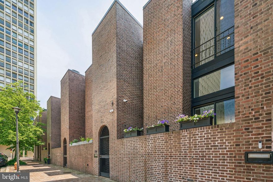 Welcome to this meticulously crafted home in Society Hill designed by Louis Sauer that offers an eloquent blend of modern comfort and timeless details.  Completely renovated in 2017, this 4 bedroom, 2.5 bath home has approximately 2752 square feet.  As you enter the foyer, you are greeted by an expansive living space, 11 feet ceilings, white wainscoting, custom moldings, a fireplace with a marble surround, oak hardwood floors, and an abundance of natural light pouring through the floor to ceiling windows.  Just outside the living room is a slate patio overlooking the tranquil street and beautiful landscaped gardens.  The gourmet kitchen features stainless steel appliances, custom cabinets, a Carrara marble backsplash, under counter lighting, with an island.  Adjoining the kitchen is the dining space with a bespoke shelving and cabinetry perfect for seamless entertaining.  Relax in the peaceful primary suite with a walk in closet, a skylight, and an elegant bathroom that has a shower with extra wall jets and a Arabesque marble tile design.  There are two additional bedrooms on the floor with a full hall bathroom.  In the lower level, enjoy watching your favorite movie or entertaining friends in this large bonus room with built in speakers. It has a large window that frames the back patio and the garden and an additional room that was used as a home office but could be a bedroom.  There is gated parking for two cars, one right behind the home and the other is spot #24 in the association lot.  Finest location in a historically preserved neighborhood, with enchanting green spaces such as Three Bears Park, Independence Park, and the upcoming 11.5 acre park with the 95 capping project, while being a quick walk away from a myriad of fantastic restaurants, cafes, the Ritz and PFS theaters and only a 15 minute ride to the airport.