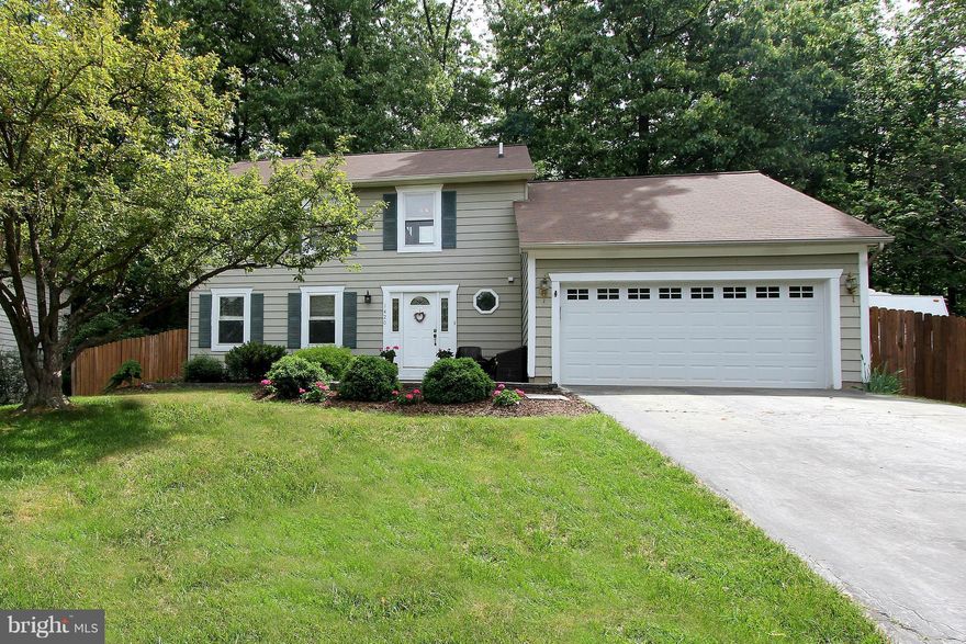 JUST REDUCED!! Your new Home boasts a great Eat-In Kitchen/Family Room w/ Skylights, Maple Wood Floors, Recessed Lighting & a Wood Stove in the Family Room! Hardwood Floors in Br's, Bonus Office/Library/Guest room in the lower level. Enjoy a Parkland View from the Back Porch while BBQ-ing or walk to Herndon's Quaint Downtown & Friday Night Live.  2 car garage w/ attic storage.