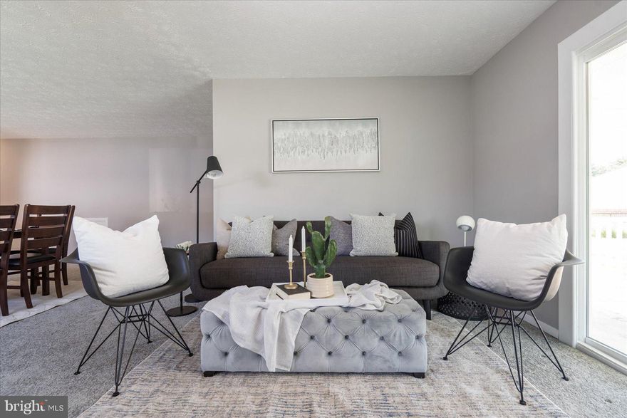 Stunningly renovated duplex has so much to offer! Main level living at its best! This home offers 4 bedrooms,  1.5 bathrooms, Stunning kitchen with stainless steel appliances, granite countertops and tile backsplash. Continuing throughout the home enjoy the open concept living room / Dining room combination which brings in tons of natural light. Step out back and enjoy the private covered patio and fenced in yard perfect for those summer nights!j