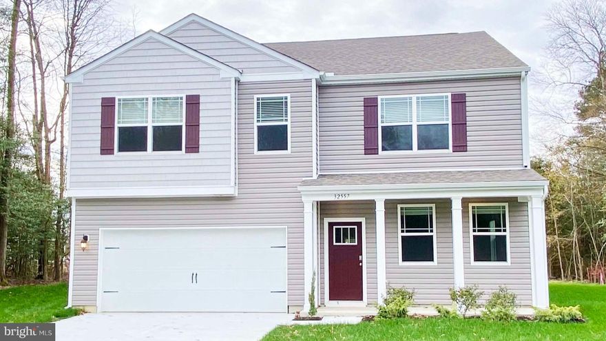 Explore 534 Carriage Boulevard, a new home on a corner homesite backing to a tree line in the Magnolia Estates community in Magnolia, DE. The Hanover, a contemporary 2,804 square feet two-story home, features four bedrooms, two and a half bathrooms, a flex room, a home office and a two-car garage. 

As you step into the distinct foyer you will appreciate the office with French doors that provides the perfect space for a home office or a private den. The flex room is versatile and could be used for a formal dining room or a playroom. 

The spacious kitchen boasts an abundance of classic white cabinetry and granite counter space, an expansive walk-in pantry, a large island with room for seating and stainless-steel appliances. The kitchen has an eat-in dining space that flows perfectly into the sizeable family room. The powder room is conveniently located on the first floor, and a coat closet is located near the two-car garage. 

Upstairs, the owner’s suite boasts an ample bedroom, a generous walk-in closet and an oversized owner’s bathroom with a linen closet. The three additional large bedrooms and expansive open loft upstairs allow for everyone to have their own retreat. The second floor also features the laundry room, a roomy secondary bathroom with double vanity and a large hall linen closet. 

The included white window treatments and an innovative America’s smart home® package will give you complete peace of mind. This home will also feature a fully sodded, irrigated low-maintenance lawn. 

Pictures, artist renderings, photographs, colors, features, and sizes are for illustration purposes only and will vary from the homes as built. Image representative of plan only and may vary as built. Images are of model home and include custom design features that may not be available in other homes. Furnishings and decorative items not included with home purchase.