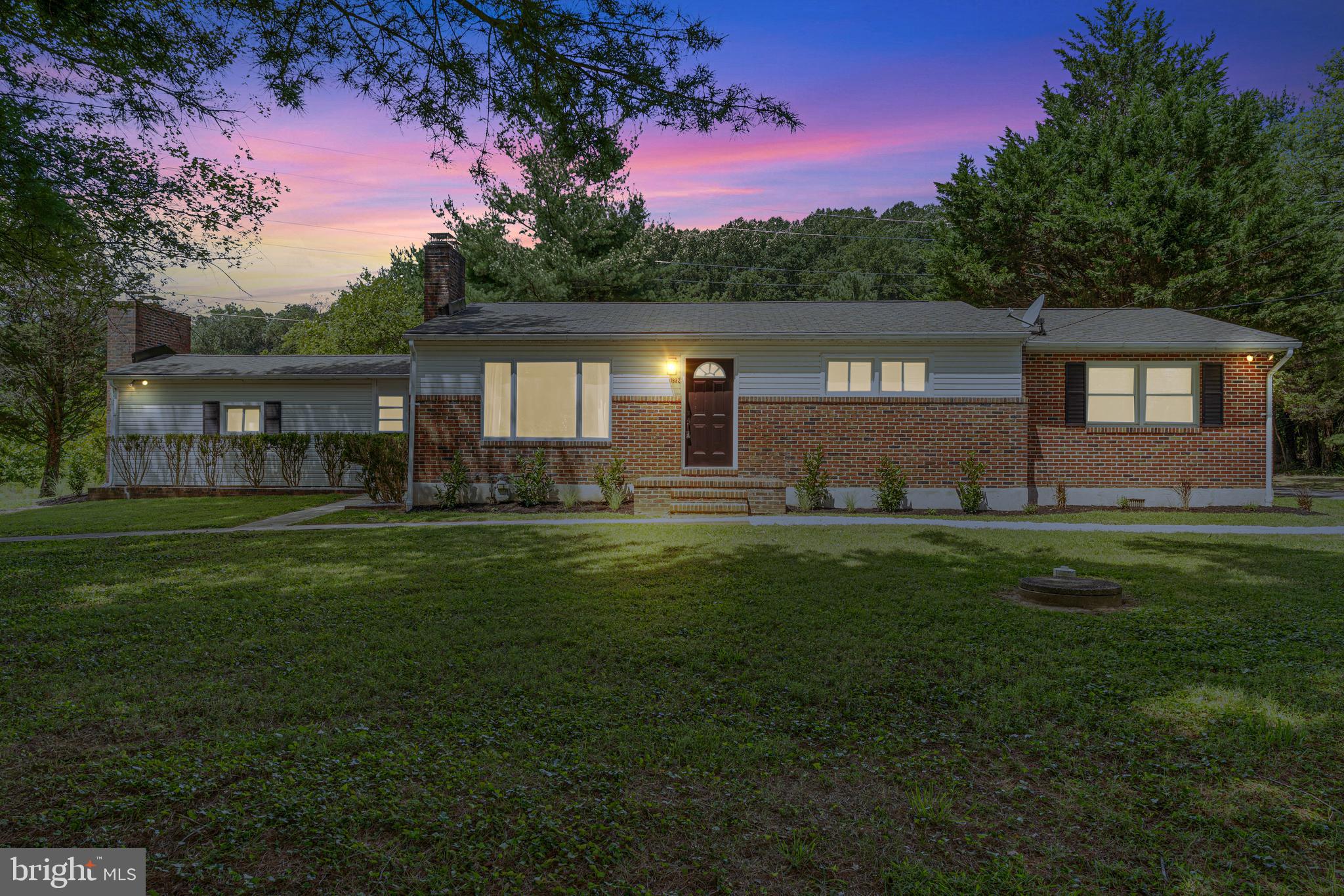 Welcome Home! Located in highly sought after Glen Arm and perched on a 0.85 +/- acre lot sits this tastefully updated 4 bedroom, 3 bath ranch-style home with amenities galore. Throughout its 2,900+ fully finished square feet, you'll appreciate brand new soft-close 42" Tribeca cabinetry, Calacatta Caviar quartz countertops, sleek stainless steel appliances, custom bathroom tile work, modern recessed lighting and fixtures, freshly refinished hardwoods, waterproof and durable luxury vinyl plank, central HVAC w/ 5 year warranty, two wood burning fireplaces (one with a heatilator... and yes, it still works!), primary suite, expansive formal dining room/second living room off the kitchen, a four seasons room overlooking your rear yard, finished basement and so much more!
On the exterior, your eyes will immediately latch to the stunning red outbuilding with an oversized 10' garage door, separate electric panel with 220v receptacle, new architectural shingle roof and 640+ square feet of usable floor space to comfortably store everything from boats, trucks, trailers, lawn equipment and beyond. The wrap around driveway makes entering and exiting a breeze, mature landscaping provides an added sense of privacy and freshly mulched flower beds make for one less thing to do. You'd never know it by the scenic pastoral views and rural setting, but your new home is less than 15 minutes from major shopping hubs in heart of Towson, the Four Corners in Jacksonville, and even closer to staple attractions like Loch Raven Reservoir, Prigel Family Creamery, and Boordy Vineyards. Schedule your private tour today and don't miss this rare opportunity!