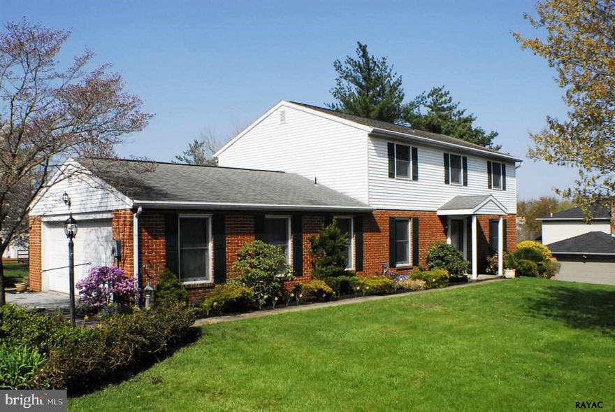 Move in condition home in fine neighborhood.  Mature landscaping, Screened in porch off Family room, hot tub on patio remains with the property.  Well maintained, low maintenance, replacement windows, convenience of 2 1/2 baths.  Furnace has humidifier system, 200 amp electric service.