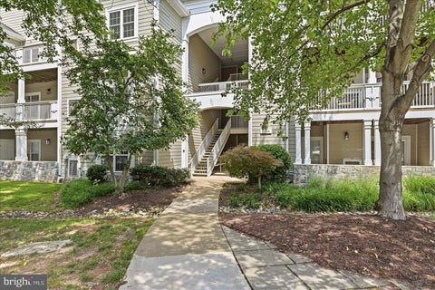 Photo of 1700 Lake Shore Crest Drive #31, RESTON, VA 20190 (MLS # VAFX2345816)