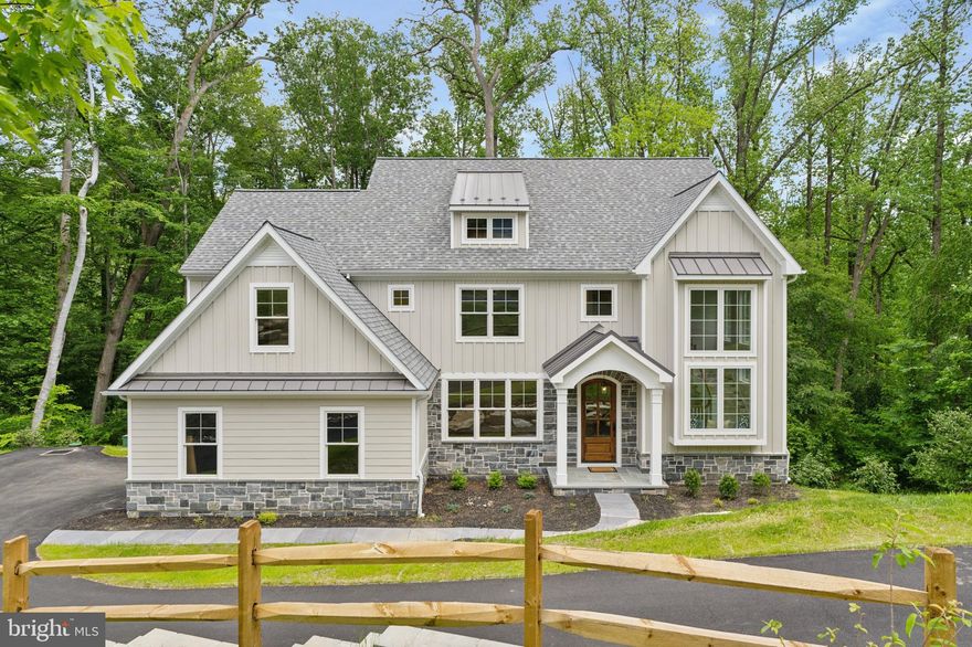 Nestled in a breathtaking location with serene reservoir views, this meticulously crafted custom home offers an exceptional blend of elegance, comfort and high-end design, with easy access to each floor provided by an oak paneled elevator. The exterior showcases Hardi Plank siding and natural stone, combining durability with timeless beauty. Step inside and experience custom millwork throughout, including 5/4 Adams casing and 7-1/4" baseboards, crown moldings and a staircase to die for, a true architectural masterpiece. The white oak floors add warmth and character, flowing seamlessly through the first floor and second floor hallway.
At the heart of the home, the truly custom kitchen is a chef's dream, featuring Goebel Custom Cabinetry with an intuitive design that makes entertaining effortless and top-of-the-line Stainless steel Thermador appliances including a commercial range, speed oven and built-in refrigerator. Adjacent, the breakfast room offers panoramic views of the woods and reservoir, creating the perfect setting to begin your day.
The master suite is a private retreat, boasting a European-style walk-in shower, a spa-like soaking tub, and high-end Koehler fixtures designed for relaxation. Additional conveniences include a private elevator for seamless access to all levels as well as a fire sprinkler system for enhanced safety.
Every detail of this home is designed for both style and functionality, including a well-appointed mudroom with built-in cubbies and bench, keeping daily essentials organized with ease.
Don't miss your chance to experience the craftsmanship, breathtaking views, and luxury living at its finest.