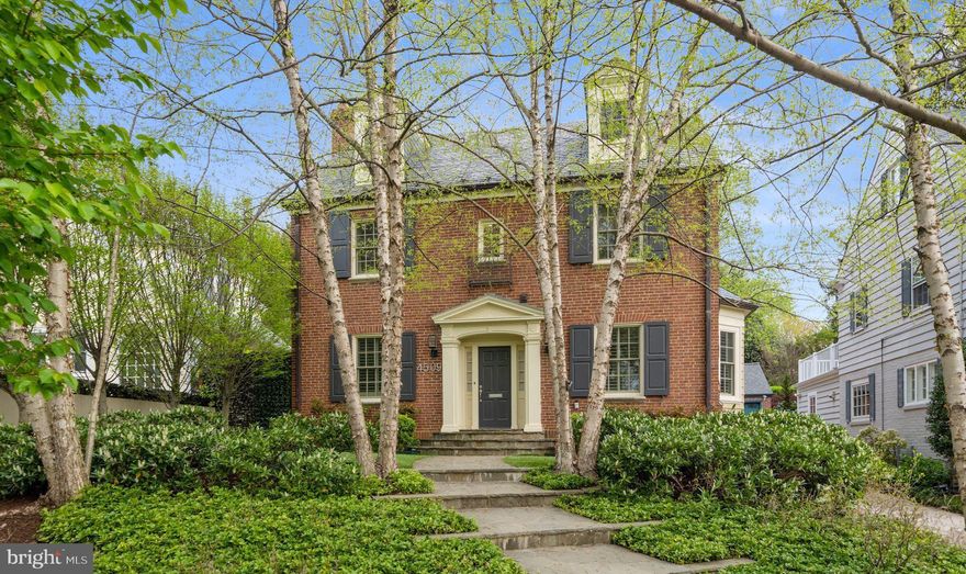 A total re-imagining of a timeless colonial home in the Greek Revival style in Wesley Heights.  Expanded as part of an award-winning contemporary styled renovation and extensively updated by the current owner, this home is a rare offering for Washington DC. Some of the high-end upgrades and additions include all new hardwood floors, new replacement windows, custom kitchen cabinetry and thoughtful built-ins. These updates have elevated an already exceptional open concept living space that is perfect for entertaining.  

Natural light washes over all four levels of this home via a floating staircase set inside a glass cupola.  On the main level a full-length wall of French doors allow easy access to the manicured and landscaped rear garden with Japanese green screen fencing and offers exceptional views of the pool area.  The pool with swim jets and an electronic cover is flanked by European hornbeams, a pool house (or detached garage), flag stone patio and an exterior spiral staircase to a second-floor terrace. 

Upstairs on the 2nd floor is a sumptuous owner’s suite with private terrace access and two additional bedrooms and a hall bathroom. The owner’s suite includes a barreled ceiling, a spa like bathroom with Waterworks jacuzzi and shower fixtures, double sinks, and rich tumbled marble finished stone with stone crown molding. A fourth bedroom suite in the reconfigured loft space offers a private guest space complete with its own bathroom.  

A lower level with outdoor access offers either a cozy recreation room or fifth bedroom with built in shelves, full bathroom, large utility room and extra storage.

A must see home perfect for the discerning buyer.