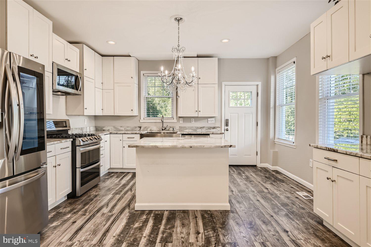 Beautiful 5BR/2.5BA located in Callaway-Garrison. Step into a remodeled home with a spacious private yard featuring a parking pad and tool shed.
Newly renovated including : Plumbing, HVAC and Electrical 200+ amperage.
Energy Saving: Dual Air conditioning units with 2 separate thermostats.
*Basement/1st floor
*2nd/3rd floor
Features included but not limited to:
-Hardwood floors
-Exotic granite countertops with island
-LG stainless steel professional grade appliances featuring double ovens
-Renovated full bath with bluetooth speaker and jacuzzi tub
-Renovated full bath with standup shower and Kohler collectible vanity
-upgraded steel security doors both front and back
-energy efficient windows
-finished basement with family room/office space
-sump pumps in both front and back of house including French drain for proper drainage out to street side
*Investors: Current use and occupancy permit
This home is move-in ready and in close proximity to shopping, restaurants and commuter routes.