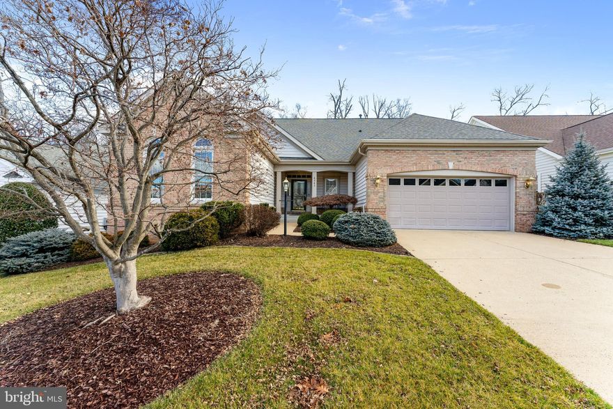 Stunning , Upgraded, and Meticulously Maintained Brick Front with Brick Front Porch Original Owner Home in Northern Virginia's Premiere Active Adult Community Heritage Hunt.  Executive Collection "Lakemont" Model with Premium Lot Backing to Trees.  Gleaming Main Level HARDWOOD Flooring Throughout.  Upgraded Kitchen boasts beautiful Maple Cabinetry, Huge Center Island, Granite Countertops, and Newer Stainless-Steel Appliances.  Family Room and Living Room share  two sided Gas Fireplace.  Cozy Formal Dining Room.  Bright and Airy Living Room with adjoining Extended Rear Sunroom with door leading to covered patio backing to woods.  Primary Bedroom Suite features Cathedral Ceiling, Large his & hers Walk-In Closets, and Private Luxury Bath.  Spacious 2nd Bedroom on Main Level.  Upgraded Main Level 2nd Full Bath.  Den/Bedroom Three currently used as office.  Lower Level Walk-Up Unfinished Basement with several full windows.  Newer Roof , In Ground Irrigation System, and so Much More.