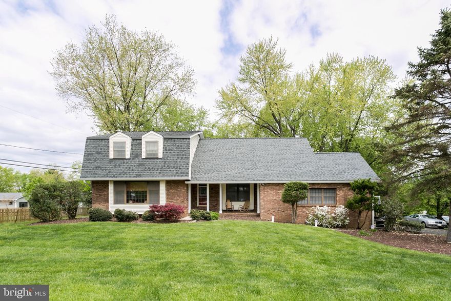 Fantastic opportunity to own a beautiful home on one of the most desirable streets in Ellicott City! Sited on a spectacular flat half-acre lot ringed with towering trees, this custom-built home offers an open floor plan and abundant natural light. Many recent updates and upgrades include brand-new roof and gutters, and new stainless appliances. Enter through an inviting, covered front porch and into an open foyer, with gleaming hardwood floors stretching in all directions. Kitchen is upgraded with maple cabinetry and Corian countertops; and the adjacent sun room makes organizing daily living a breeze. The kitchen flows into family room with a raised wood-burning fireplace. First level also features huge sunken living room, dining room and a convenient sunny office. Expansive deck off family room overlooks a tranquil yard perfect for sports and games. Four bedrooms on the upper level include a master suite with sitting room; renovated spa-like master bath, walk-in closets and a private, covered deck perfect for morning coffee. The enormous finished basement features new carpet and a spacious rec room and exercise space, possible fifth bedroom and half bath. Extensive list of recent updates and upgrades available!