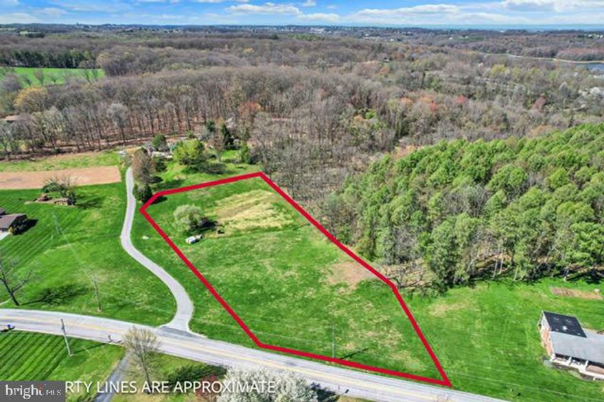 Excellent opportunity to build your dream home in the highly sought-after South Western School District! Nestled on 1.73 acres and surrounded by the natural beauty of Codorus State Park, this property offers incredible potential and value.
Enjoy the perfect blend of privacy and convenience—this serene setting provides a peaceful escape from the hustle and bustle, while still being just a short drive to everyday amenities. Whether you envision a custom-built retreat or a luxurious getaway, this location sets the stage for a lifestyle centered on relaxation and refined living.
With ample space to design, build, and entertain, this lot is truly a blank canvas awaiting your personal touch. Please note that the property line outlines are approximate that have been drawn on the photo; please refer to the survey for accuracy. Don’t miss your chance to create something special in this picturesque setting!