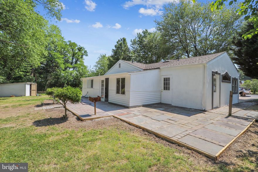 Opportunity is knocking for dream homeownership. One level living within walking distance to RTE 1.   *****Located in half an acre of prime real estate value. You can expand or build your own home from the ground up. Great investment*****    Lots of space for business owners that need space to park, store their equipment, etc.   FEATURES  Water heater-  5 years Roof - 7 years (Timberland) Carpet - 1 year HVAC - 7 years Condenser - new Gutters - new,  just installed Bathroom Faucets - new   Electric outlets - new for the entire home Door knobs - new  Kitchen disposal - new  A new sliding glass door in one of the rooms Fresh paint inside and out New vanity and mirror in the full bathroom Ceramic tile in the kitchen And more!   **** NO HOA ****   All of this in a great location, minutes from shopping, dining, bus stop. I-95, RTE 1, within 15 minutes of Amtrak Station. Walking distance to Veterans' Park Community Center.