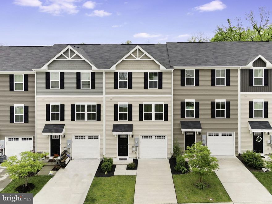 Welcome Home to this turnkey, well-maintained 3 bedroom, 2 ½ bath townhouse with a 1 car garage in a fantastic location just minutes from historic Old Town Winchester! Built in 2019, this spacious corner townhouse is available for lease. It features three bedrooms with walk-in closets, two full and one-half bathrooms, and a kitchen with a center island, stainless steel appliances, and upgraded fixtures. The main level has an open concept with a family room, eat-in kitchen, living room, and dining area. The sliding glass door leads to an oversized Trex deck overlooking green space, perfect for relaxing and entertaining! The terraced backyard is landscaped for easy maintenance and has privacy fencing. The upper-level primary suite includes a full bath ensuite and walk-in closet, along with two additional bedrooms, a hall bath, and a laundry room. The entry level has a bonus room for an extra bedroom or office. Upgraded features include exterior security cameras and a Blink video doorbell. The Regents Crest community offers a walking trail and playground. Conveniently located near shopping, dining, schools, medical facilities, Shenandoah University, Route 7, and Highway 81.