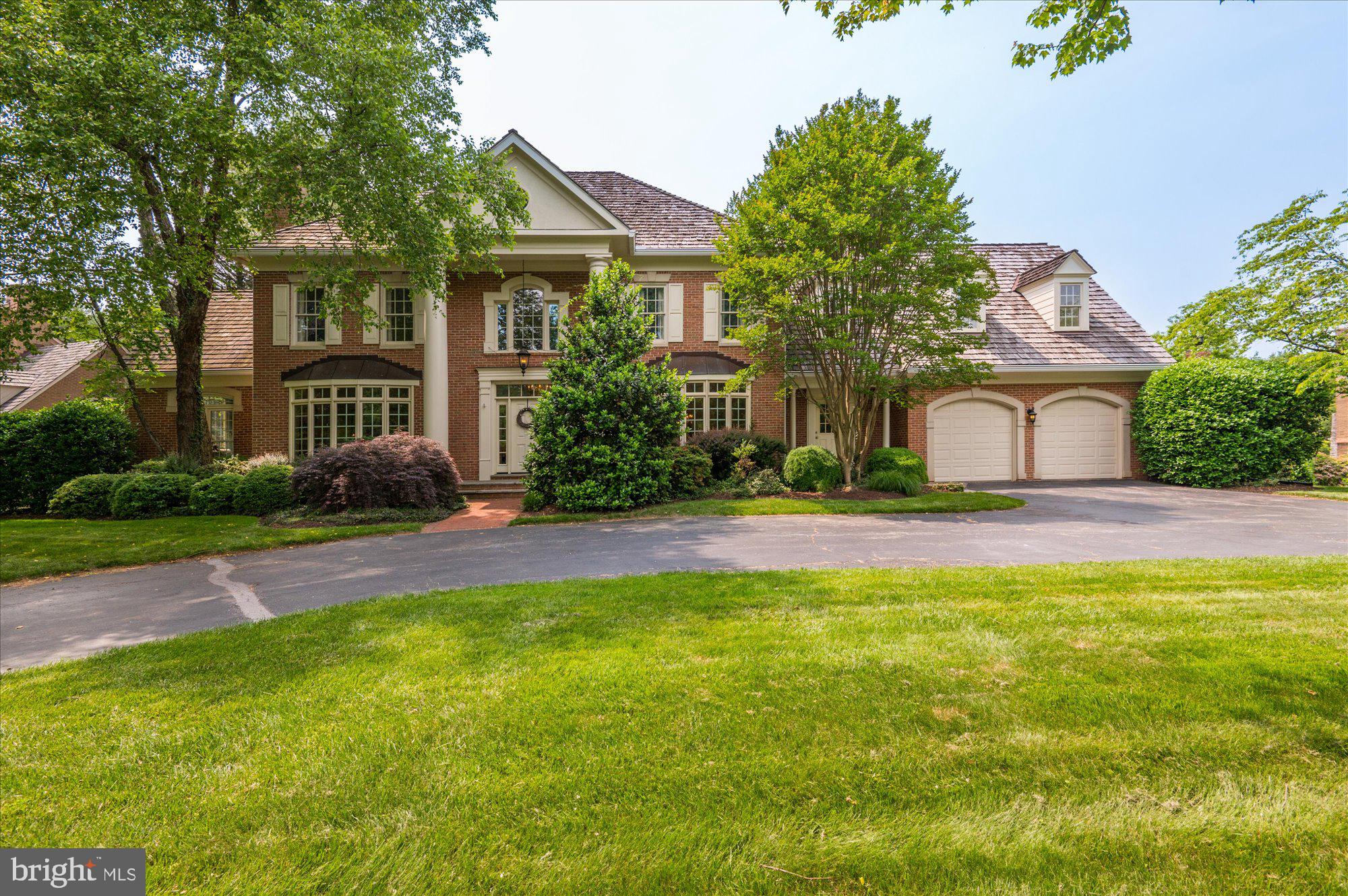 By Appointment only 12-4pm starting Sunday, May 28th. This one is a 10! Welcome to 9708 Avenel Farm Drive sited on a beautiful lush landscaped lot. This stunning light filled Mitchell and Best residence has been recently renovated and expanded to provide all the exciting spaces for todays living! The circular driveway welcomes you with ample parking for six to eight cars. An elegant two story entryway offers easy access to all the major rooms which provide views from the outdoors in. The main level offers a light filled living room with fireplace, opening to a spacious sunroom and separate library/office. The beautifully renovated gourmet kitchen opens to two separate family rooms perfect for today's living. Entertain easily in the private dining room with views to the outdoors. The windowed two story foyer and main staircase lead up to the bedroom level. The more than ample owners suite with stunning new bath provides generous closet and wardrobe space. Three additional bedrooms and two additional baths complete the second level. A surprise back staircase leads to the main level. The fully finished lower level welcomes you with multiple tv/gaming areas, and a full bar, plus an additional lower level office and full bath plus large storage room. A two car garage on the main level of the home completes this welcoming residence all in move in condition!