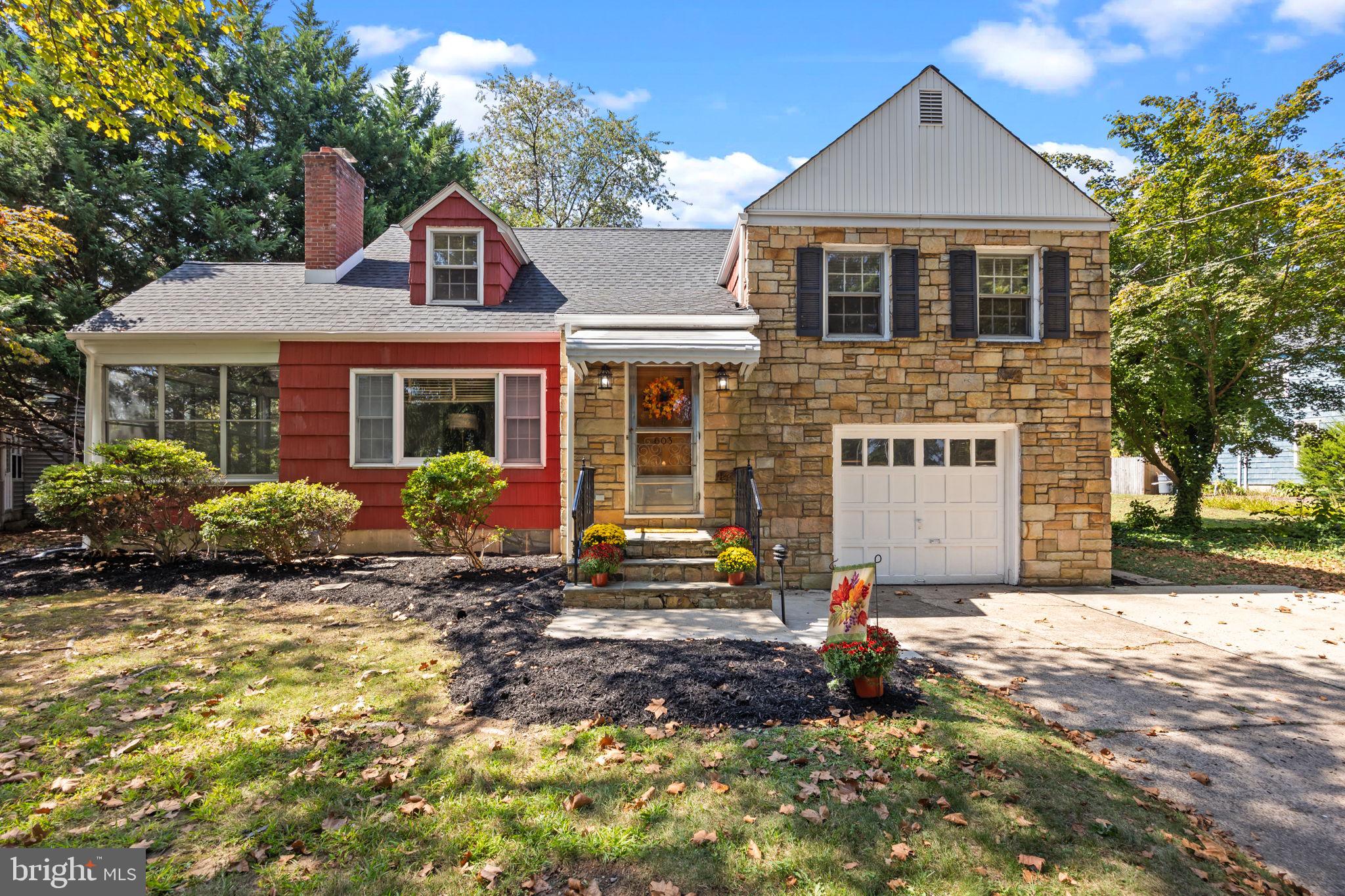 Natural light, hardwood floors, and timeless character come together in this spacious split-level home. From the moment you walk into the living room, you’ll notice the large picture window that fills the space with a warm glow and the decorative brick fireplace that anchors the room. The adjoining dining room is accented with hardwood flooring and an arched entryway that adds just the right touch of charm. The kitchen blends vintage appeal with plenty of storage and workspace, and the window above the sink frames a relaxing view of the backyard. Upstairs, the private living spaces include generously sized bedrooms with hardwood floors and ceiling fans. Two full baths have been beautifully maintained, and the primary bedroom offers plenty of space to create your own retreat, complete with a cedar closet. On the lower level, a powder room and laundry room add everyday convenience, while the basement provides even more possibilities with a workshop area, hobby space, and room for future finishing. Outdoors, a screened porch with brick accents is perfect for enjoying a morning coffee or an evening breeze, while the oversized double lot with mature trees is ideal for entertaining, gardening, or play. Additional highlights include an attached garage, driveway parking, a covered front entry, and a flexible multi-level floor plan that makes daily living easy. This home offers the perfect balance of comfort, character, and space, ready for its next owners to move in and make it their own.This home sits on a DOUBLE LOT plenty of space to add on,or subdivide if permited by morrisville boro. Lot square footage is larger than public records states.