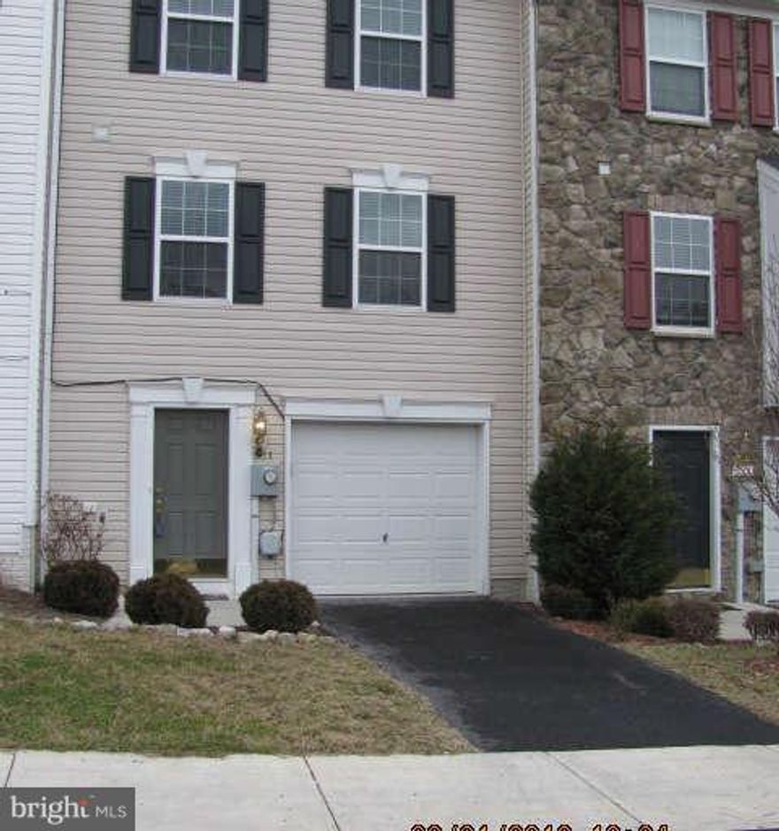 Newly remodeled TH in beautiful Trout Run Subdivision! Lower level completely finished with ceramic tile, wood floors, halfbath,new washer & dryer, garage door openers and work shop. New appliances, new paint every room, Efficient gas heat, range andhot water. Sit on your private deck that backs to Mills Creek. Hurry available now!!