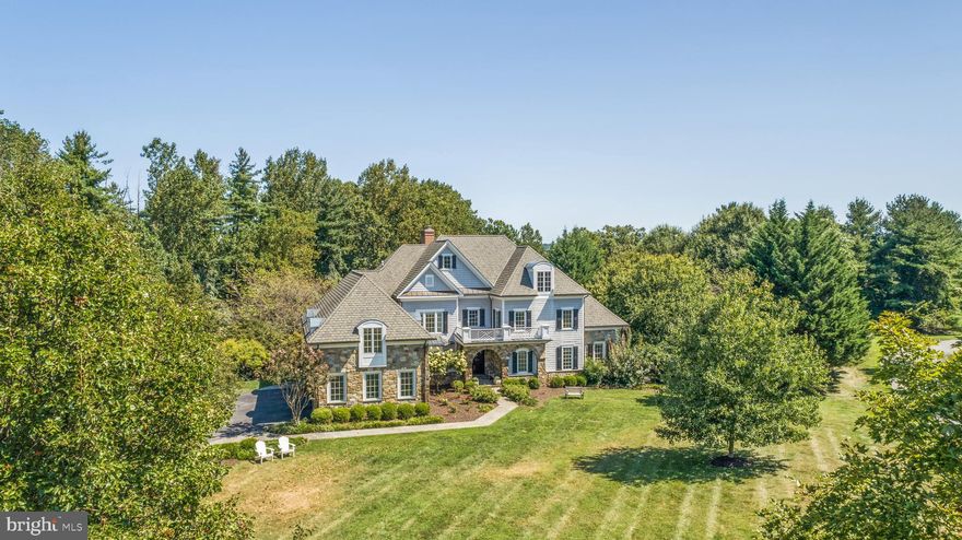 Become enchanted by 39 Brett Manor Court, meticulously updated and ready for your moving boxes. Located on a premier lot within Nicholson’s Manor, enter through the tree lined driveway into a spacious three car garage. A beautiful covered porch and double doors welcomes you inside to the two story foyer which flows directly into the modern, open floorplan. Past the dining room find a freshly faced kitchen featuring marble countertops, luxury high end gas range, large walk-in pantry, and a built- in breakfast nook with an additional living area. Captivating the eye, a full length deck has access points from the kitchen, living room, and primary bedroom. Down the hall past a wood burning fireplace and oversized living room the main floor primary suite is complete with dual-walk-in closets, a vaulted ceiling, and spacious primary bathroom. Rounding out the main floor is a separate office space and additional full bathroom both large enough to be a secondary primary suite. Upstairs is perfectly designed for guests and family alike, featuring an additional living space, five large bedrooms, and three full bathrooms. One en-suite bathroom, one pass-through bathroom, and one hall bathroom suits the needs of all upstairs residents. Downstairs, the walk-out basement provides endless opportunity for activity; a great room, game room, golf practice area, sizable fitness center, and potential bedroom with bathroom if preferred. Not to be outshone by the interior, the exterior is where 39 Brett Manor Court truly shines. Perfect for the end of summer a gorgeous pool and extensive landscaping beckons homeowners to relax. Don’t miss this incredible opportunity to have an exceptionally updated home in such a highly coveted location!