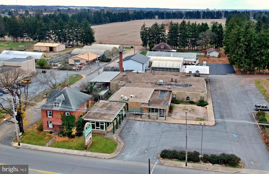 MOTIVATED SELLER HAS MADE SIGNIFICANT PRICE ADJUSTMENT!  The property contains 4 parcels on high traffic US RT 30.  Only minutes to Interstate 81  The AADT (traffic count) is approximately 18,000.  The frontage on RT 30 is approximately 244 FT.  High visibility and exposure on west drive from center of town.  Approximately 1.12 AC includes improvement with a 13,300+/- SF single and partial two-story, retail building.  The retail building is currently operating as a florist showroom and is owner occupied.  The improvements consist of several attached structures to the main building that provide storage for equipment and tools.  Also included is a two story house situated on the parcel located on the corner of LWE and Plasterer Ave.  This building is approximately 2,300 SF.  This parcel also includes another detached two-story, duplex operating as two apartment units situated on the western side facing the property.  The first floor apartment is a two-bedroom, one bath unit and the second story is a one-bedroom one-bath unit.  DCH zoning.  Daycare, medical, retail, office, restaurant, the opportunities are endless.  Don't miss this commercial opportunity in the Borough of Chambersburg with 244 ft plus of frontage on Route 30 East.