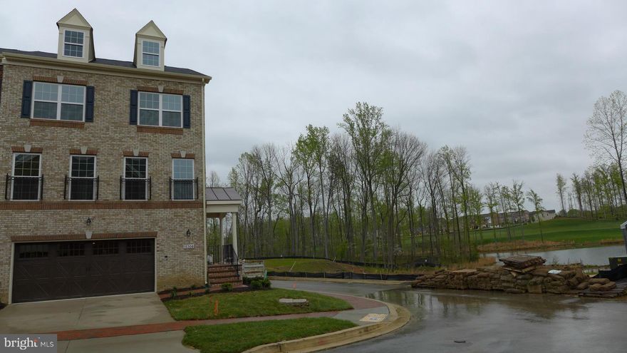 END-Unit WATER VIEW  townhouse in golf course community features 3 bedrooms, 3 full and 1 half baths, finished rec room and 2 car garage. Master suite with huge walk-in closets, separate shower and bath. Great WATER view from most of ROOMS. Free using club house with fitness, tennis, and swimming pool. You will enjoy the most beautiful community and club facilities. Close to Rd 301, 4 and 214.