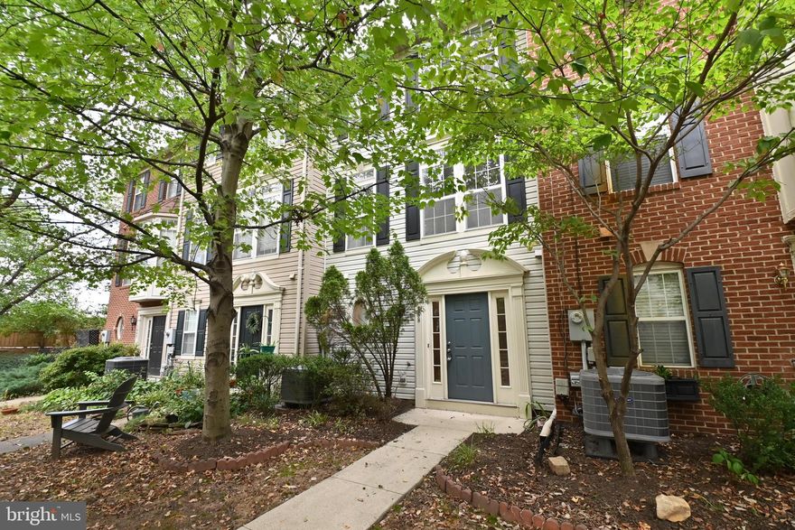 Welcome to a beautifully renovated 4-level townhouse in super-convenient Summers Grove across from the Van Dorn Metro Station. Now, you can enjoy easy transit by train while your vehicles rest in the large 2-car garage with extra storage. This lovely property features 3 bedrooms, 2 full bathrooms (one with a tub/shower, one with a stall shower), and a half bath on the entry level. Enjoy beautiful hardwood floors on two levels, a renovated kitchen with quartz counter tops, an island, two bar seating areas, and stainless steel appliances. The open concept living area has a gas fireplace and balcony for grilling. Upstairs, there are 3 bedrooms on one level. The primary bedroom has a walk-in closet. Both full bathrooms are newly renovated. The top floor is perfect for a deluxe office or rec room area. The community has a lovely pool, playground, clubhouse, and visitor parking. Also very close by are grocery stores, coffee shops, award-winning parks, restaurants, and more. From this location, commuting is now relaxing and productive. You'll arrive refreshed wherever you go. Travel by plane? Go from your door to the gate in the airport in 30 minutes without a car. This is an excellent value that will go quickly.