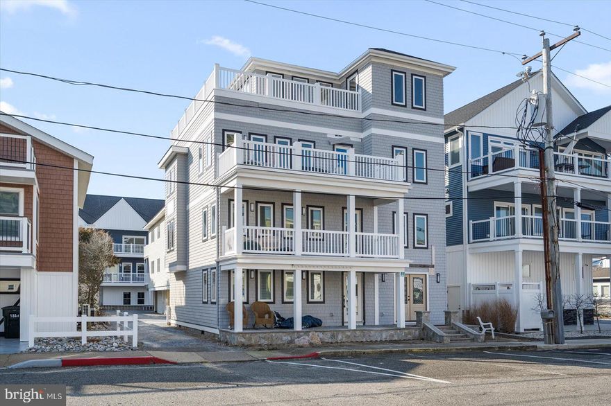 Welcome to this truly exceptional and rare 12-bedroom multi-family residential listing located just steps from the beach in the highly sought-after midtown Ocean City! The 83rd st ocean block offers an optimal beach experience with minimal density in the surrounding area. The entire property consists of 2 buildings and comprised of 4 units:  two 3-bedroom/2 bathroom units, one 2-bedroom/2 bathroom unit, and one 4-bedroom/3.5 bathroom unit. The back building is where you’ll find the two 3-bedroom, 2 bath units boasting with ocean views from each units balconies, the living rooms and great parking. The front building left side unit is a ground level 2-bed 2 bath upgraded apartment with a tenant already paying $1795 a month and is responsible for the electricity bill along with cable/internet. As of 1 April, there is a month-to-month lease in place, requiring 30 days notice for cancellation from either party. Interested buyers could be told that the tenant welcomes a longer term lease.  The right unit is a 4 bedroom 3.5 bath house waiting for its next owners finishing touches. Many upgrades made to this entire building within the last 3 years including a complete exterior overhaul. The house features beautiful ocean views from all balconies, living room, two primary bedrooms and a light filled flex room on the top floor where you’ll find a rough in for the half bath and access to the spectacular ocean view wrap around roof top deck. Electrical and plumbing are in place. Owner had electrical put in to support an elevator. Lots of construction material onsite including stair treads, doors, etc. Bathrooms are near completion with marble finishes and a freestanding tub in the primary. The kitchen comes right off the sunny ocean view living room with ample cabinets installed and a space for dining. Come see this property for yourself and all the potential is has to offer. Live in one and rent the rest or rent all four all summer and make an estimated 160-190k in rental income. Situated near local restaurants, shops, and mini golf, providing a fantastic lifestyle for tenants and guests.