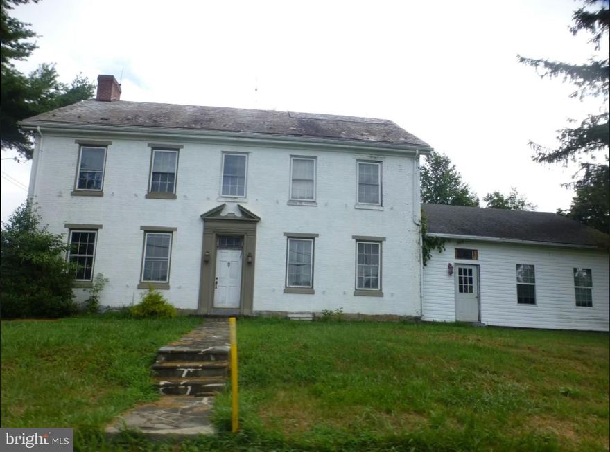 Farmhouse with over 4000 sq ft of living space and over 12 acres of land come together for this Property. Additional outbuildings including barn and garage are also apart of the property.