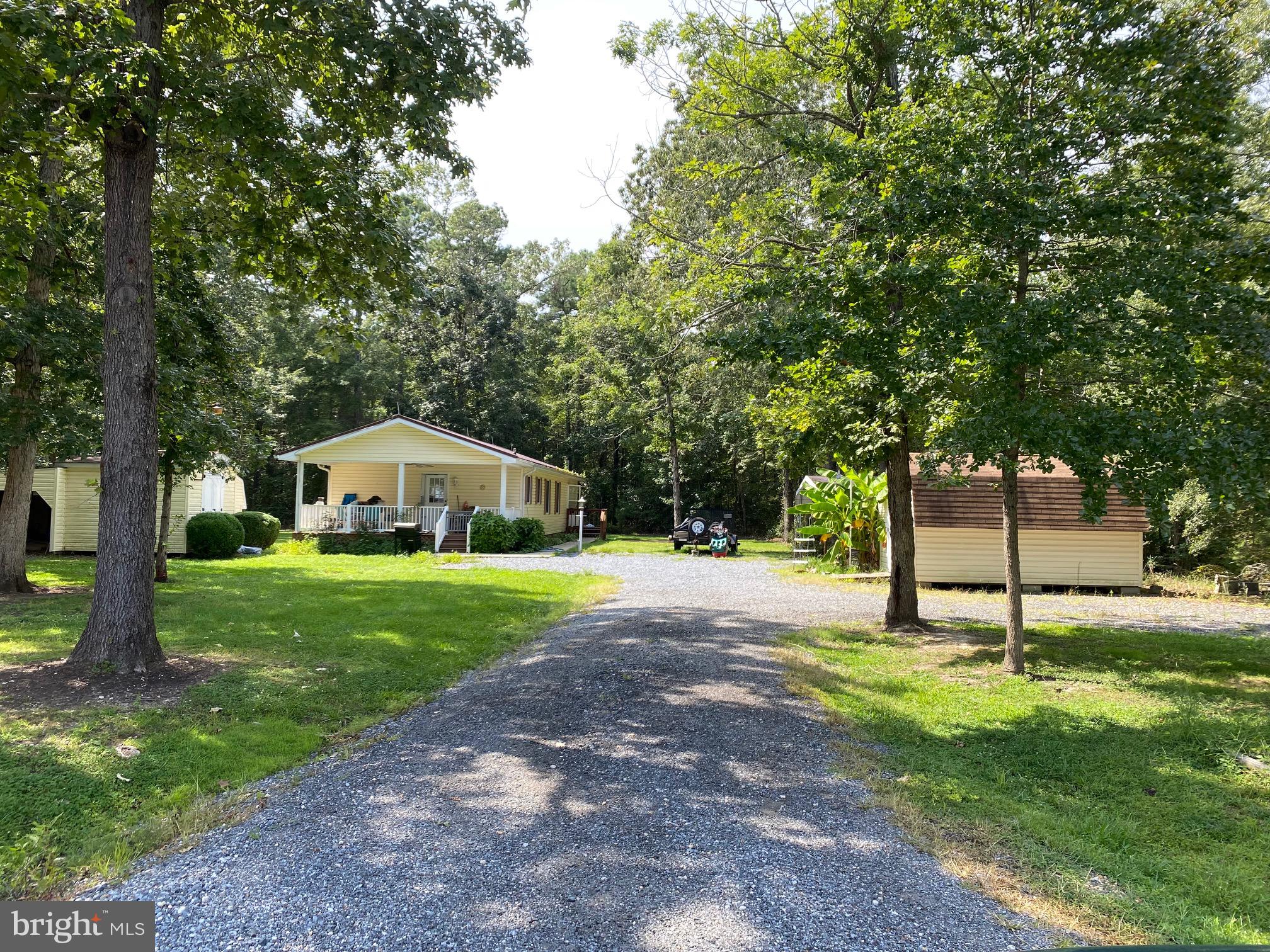 Nice setting with 2 bedrooms and 2 baths. Good credit and references please. Pets considered on a case-by-case basis. 3 sheds and a carport are also included in rental. Available November 1.