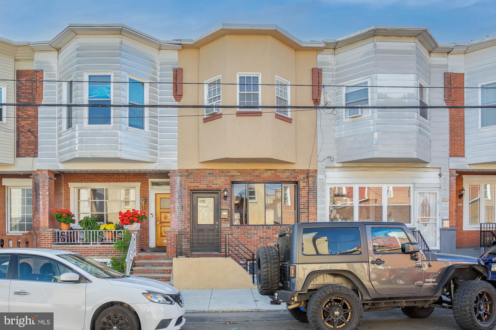 Great opportunity to be in the Girard Estates neighborhood. This is a surprisingly large 3 bedrooms, 1.5 bathrooms with a finished basement. Right off Passyunk Ave with easy access to 76 East and West, the airport, the stadiums, BJs, Home Depot, Philip's Steak, super markets, other stores and restaurants.
1st floor - foyer space, large living room with h/w floors, separate dining formal dining room with a large eat-in kitchen with cherry cabinets s/s appliances and entrance to small patio.
2nd floor - Large front bedroom with bay windows, with w/w carpet and large closet. Hallway closet. Middle bedroom with window, ceiling fan, w/w carpet, small closet. 3 piece bathroom with window.
Large masterbedroom in the rear of the house with ceiling fan, rear window and window a/c unit in side window, w/w carpet.
Basement - full finished basement with tiling, 1/2 bathroom in the front of basement with a small closet, utilities closet, bar with stools, bench seating and a large unfinished storage room in the rear.