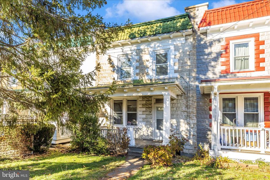 Classic 7th Street row house looking for the right owner to complete bringing it to its full potential.  This home has had many fantastic updates and is ready for more.  Enter the front living room to find a spacious layout, nice natural light and hardwood floors.  Continue into the dining room situated just off the kitchen for great entertaining.  Large half bath located on this level for a bath on each living floor.  Kitchen has been renovated recently and has a great layout with stainless appliances and quartz counters.  Upstairs find three generous bedrooms and one full bath.  Off street parking for two cars in the rear.  There are a number of cracks in the basement and one in the front of the home.  See structural engineer report from when current owner purchased.  Cracks are the same since he bought it.   ***Please be cautious on front porch***. Because of condition, this home will not go conventional financing.  Being sold strictly AS-IS.  Will need to be a cash or  FHA 203K buyer.