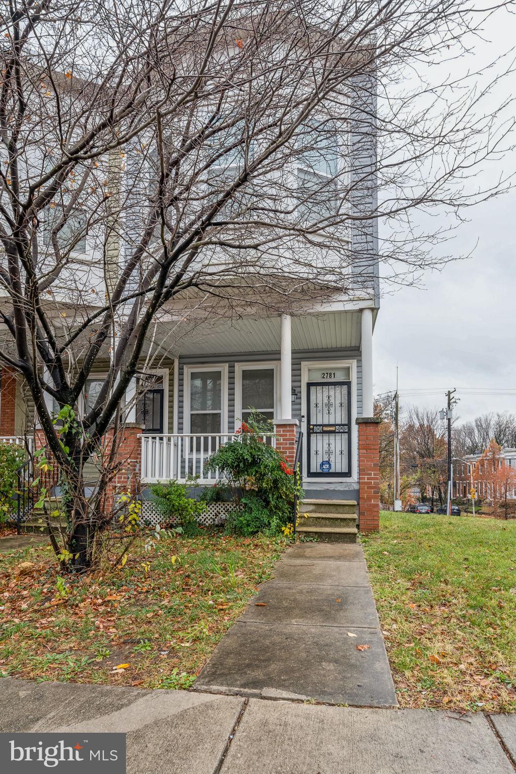 JUST REDUCED! Fully renovated in 2012 including Roof, Windows & Doors! This end of group town home features many modern updates. Eat-in kitchen features bar countertop & seating, a stainless-steel appliance package containing Refrigerator, Dishwasher, and Gas Stove with overhead Built-in Microwave. Gleaming hardwood floors float throughout the living and dining areas. Primary bedroom features a bay window allowing for an abundance of natural light and two closets. Convenient features include main level powder room, upper-level washer/dryer unit tucked away in laundry closet, rear deck leading to rear concreate parking pad, and front and rear wrought iron security doors. Sold As-Is.