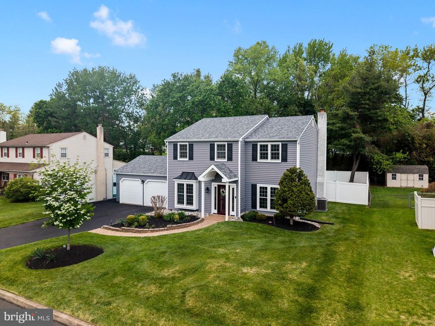 COMING SOON - Tucked away in a pristine, highly desirable Northampton Township neighborhood, 65 Grant Drive is a stunning example of effortless living and indoor-outdoor entertaining. This luminous, move-in ready 4-bedroom, 2.5-bathroom home has been meticulously updated to offer a lifestyle of absolute comfort and sophistication. With major upgrades like a newer roof, fresh vinyl siding, and energy-efficient Renewal by Andersen windows throughout already completed, all that is left to do is unpack and unwind.
Step through the front door and immediately feel the airy, open flow of the main level. To your left, an elegant dining room awaits dinner parties and holiday gatherings. The formal living space transitions seamlessly into a cozy, traditional family room anchored by a striking stone fireplace. At the heart of it all is the beautifully updated kitchen. Designed for both the ambitious home chef and the casual grazer, it boasts a sunlit eat-in area that opens right into the family room, keeping everyone connected. A clever secondary flow connects the kitchen back to the dining room, making hosting a total breeze. For ultimate everyday convenience, the two-car garage opens directly into a dedicated mudroom and laundry space, providing an ideal drop zone as you transition into the home.
Upstairs, you will find four generously sized bedrooms and a beautifully updated hallway bathroom. The primary bedroom suite is a true personal retreat. Thoughtfully designed to help you recharge, it features an expansive walk-in closet and a gorgeous, upgraded en-suite bathroom. Inside, every single room carries a sense of calm and intention.
The real showstopper awaits just beyond the kitchen doors, offering seamless accessibility to your private outdoor oasis. Step out onto the expansive covered patio and take in the large yard, fully enclosed by sleek vinyl fencing. This space was built for hosting and relaxing. Imagine summer days drifting in the stunning saltwater pool, evenings soaking in the built-in hot tub, and weekend barbecues lounging under the patio shade.
Location is everything, and this quiet, clean, and well-cared-for neighborhood delivers a premier suburban experience. You are perfectly zoned for the highly regarded Hillcrest Elementary School, Holland Middle School, and Council Rock High School South. Beyond the home itself, the surrounding area provides easy access to local parks, walking paths, and community spaces. Everyday conveniences like boutique shopping and fantastic dining are merely minutes away, offering an unmatched balance of comfort, convenience, and community.