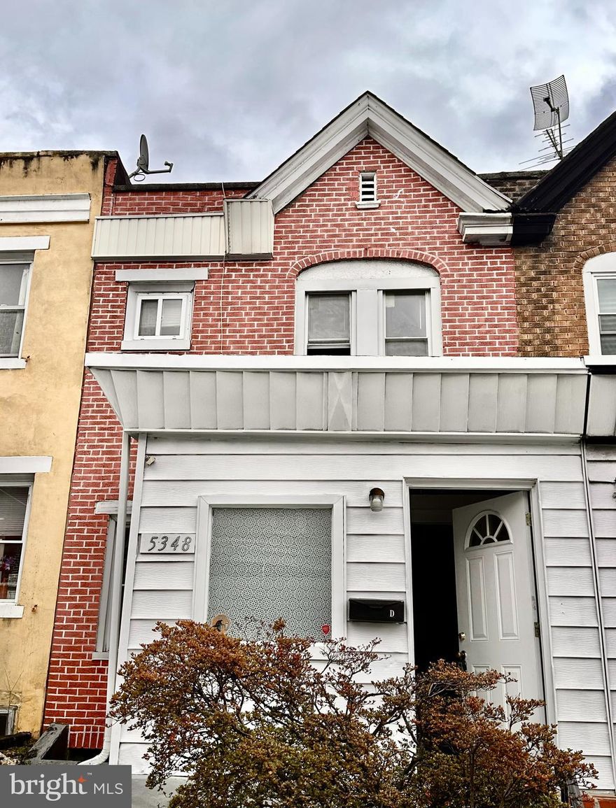 Two bedroom West Philly/Wynnefield area house available for quick occupancy. Dark stained wood floors in spacious living & dining rooms. Galley kitchen with gas range and refrigerator. New deck being constructed out back plus rear mudroom. Full unfinished basement great for storage and hobby area. Laundry hookups are installed; machines can be provided for an additional $75/mo. Upstairs find two large bedrooms with ample closet space. Nice natural light throughout. Quick access to City Ave and St Joe's University. Pet friendly with added pet security and monthly pet rent. First, last and one month security due at lease signing. Strong credit and verifiable income required. Reach out for the video tour, showings and applications. Tenants pay all utilities.