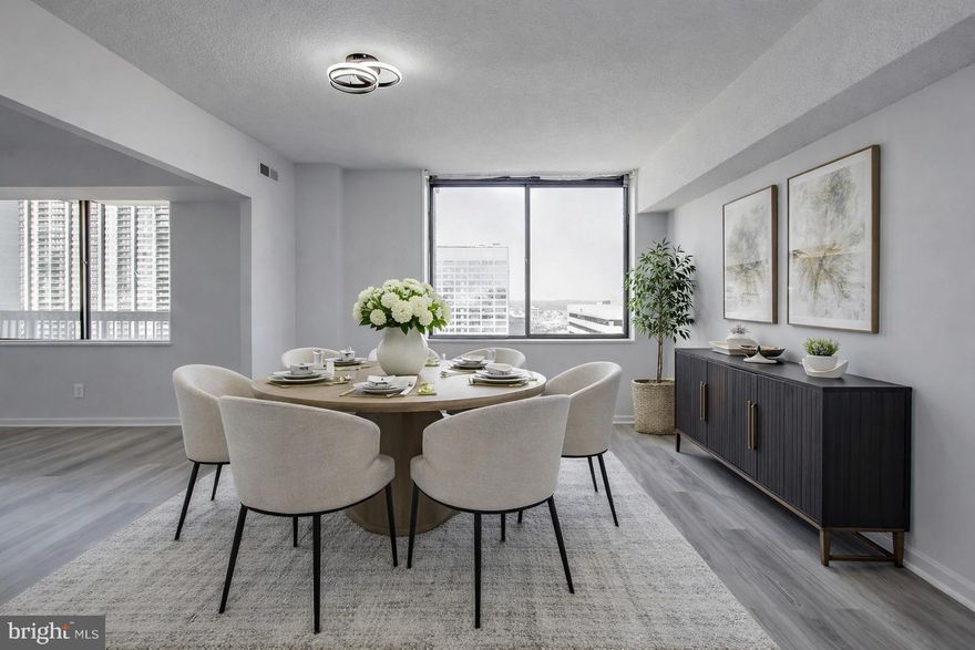 Experience resort-style living at Skyline House in this rarely available Residence #1506, the sought-after “06” model end-unit beautifully positioned on the 15th floor. Offering nearly 1,900 square feet of light-filled living space, this expansive home combines comfort, scale, and sweeping panoramic views of the Northern Virginia skyline.

Floor-to-ceiling windows surround the open-concept living and dining areas, flooding the home with natural light and creating an inviting atmosphere ideal for both everyday living and entertaining. Step onto the oversized private balcony to enjoy stunning sunset views and elevated cityscapes. Freshly painted and virtually staged, this residence is move-in ready.

The spacious primary suite serves as a private retreat, complete with an enormous walk-in closet and en-suite bath. Two additional generously sized bedrooms provide flexibility for guests, a home office, or additional living space. The rare 2.5-bathroom layout enhances functionality and convenience, making this floor plan ideal for comfortable daily living and hosting.

Skyline House is an award-winning, full-service community known for its exceptional live-work-play lifestyle. Residents enjoy 24-hour concierge and security, two state-of-the-art fitness centers, a sauna, a sparkling outdoor pool, penthouse-level billiards and entertainment rooms, library and card rooms, multiple party rooms, 24/7 on-site management, secure garage parking, and a dedicated storage unit.

Perfectly located in the heart of Bailey’s Crossroads, you are just moments from Target, Giant Food, and a variety of dining options. Commuters will appreciate immediate access to I-395, approximately four miles to the Pentagon, close proximity to Amazon’s HQ2 at National Landing, curbside Metrobus service, and a complimentary shuttle to the Pentagon City Metro. Enjoy easy access to Shirlington, Old Town Alexandria, Tysons Corner, and Washington, D.C.

Luxury high-rise living, exceptional amenities, and an unbeatable location — schedule your private tour today!