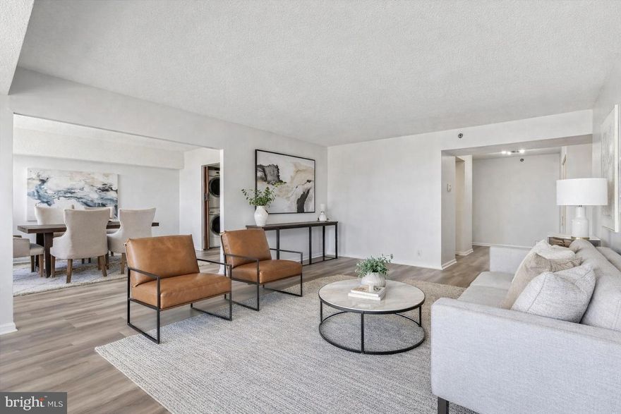 Skyline House in Falls Church is a luxury resort living experience! 
Welcome to unit #1506, a rarely available and expansive "06" model end-unit perched on the 15th floor of the prestigious Skyline House. Spanning nearly 1,900 square feet, this sun-drenched residence offers a perfect blend of scale and sophistication. The open-concept living and dining areas are framed by massive floor-to-ceiling windows, leading to a private, oversized balcony where you can enjoy sweeping views of the Northern Virginia skyline and evening sunsets.  
The primary suite is a true sanctuary, featuring an enormous walk-in closet and a private en-suite bath. Two additional well-appointed bedrooms offer maximum flexibility—perfect for a growing family, a guest wing, or a professional home office. With a rare 2.5-bathroom configuration, this layout is designed for effortless entertaining and comfortable daily living.
The Lifestyle and the Amenities are unmatchable! Skyline House is an award-winning community known for its "live-work-play" environment. Residents enjoy 24-hour concierge security and a wealth of resort-style amenities! Enjoy two state-of-the-art fitness centers, a sauna, and a sparkling outdoor pool. Penthouse-level billiards room, card rooms, a library, and multiple party rooms for hosting large events. 24/7 on site management, secure garage parking, and a dedicated storage unit. The monthly condo fee covers a comprehensive package including all utilities.
The Location is absolutely fabulous! 
Perfectly situated in the heart of Bailey’s Crossroads, you are steps away from Target, Giant Food, and a variety of dining options.  
This location is the absolute commuter’s dream- access to I-395 and just 4 miles from the Pentagon and Amazon’s HQ2 at National Landing. Curbside Metrobus service and a complimentary shuttle to the Pentagon City Metro station. Minutes to the vibrant shops of Shirlington, the history of Old Town Alexandria, 15 minutes to Tyson’s Corner, and the world-class entertainment of Washington, D.C.  
Experience the height of Northern Virginia luxury. Schedule your private tour of unit #1506 today.
Virtually staged, more pictures to come! Freshly painted!