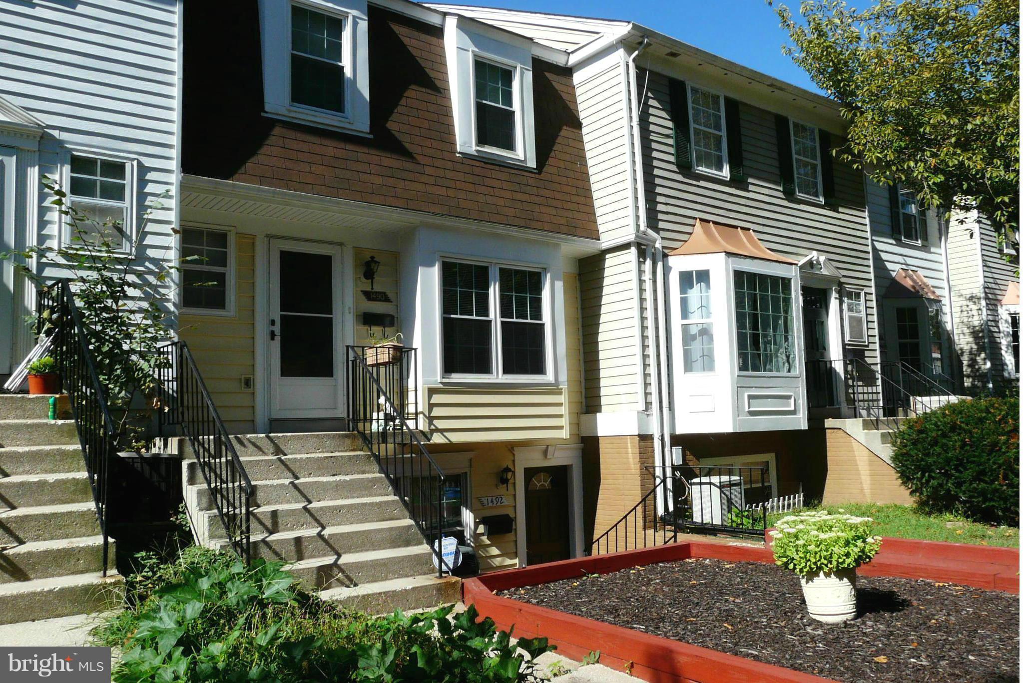 *Lovely upper level condo offering two large master bedrooms** new baths** renovated kitchen w/ SS appliances and breakfast bar** newer windows, slider & doors throughout**Freshly painted**Charming brick courtyard** ample parking and convenient assigned parking spot right outside your patio door,*** Superior location close to shopping, movie theater, parks & commuting routes.