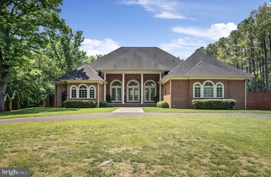 Stunning country estate set on 34+ private, wooded acres with convenient access to the Rt 7 corridor near Berryville. Recently enhanced with over $200,000 in upgrades, this remarkable villa blends timeless architecture with modern refinement.

The home showcases newly updated finishes, including a beautifully renovated kitchen, fresh interior paint, and thoughtful improvements throughout—elevating both style and functionality. Travertine and hardwood flooring, paired with stately interior and exterior columns, create a warm yet sophisticated atmosphere.

Designed for both everyday living and exceptional entertaining, the outdoor spaces are truly resort-inspired. A stunning pool anchors the property, complemented by an expansive pavilion with outdoor fireplace and a beautifully crafted brick-walled entertaining area—offering a private retreat surrounded by mature trees.

This is a rare opportunity to own a fully upgraded estate that combines privacy, luxury, and convenience in an exceptional setting.