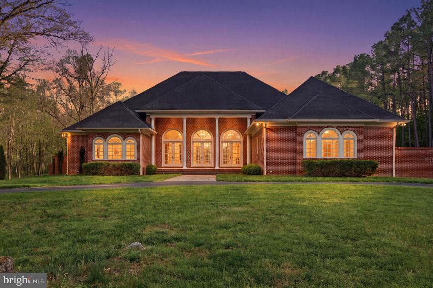 Stunning country estate set on 34+ private, wooded acres with convenient access to the Rt 7 corridor near Berryville. Recently enhanced with over $200,000 in upgrades, this remarkable villa blends timeless architecture with modern refinement.

The home showcases newly updated finishes, including a beautifully renovated kitchen, fresh interior paint, and thoughtful improvements throughout—elevating both style and functionality. Travertine and hardwood flooring, paired with stately interior and exterior columns, create a warm yet sophisticated atmosphere.

Designed for both everyday living and exceptional entertaining, the outdoor spaces are truly resort-inspired. A stunning pool anchors the property, complemented by an expansive pavilion with outdoor fireplace and a beautifully crafted brick-walled entertaining area—offering a private retreat surrounded by mature trees.

This is a rare opportunity to own a fully upgraded estate that combines privacy, luxury, and convenience in an exceptional setting.