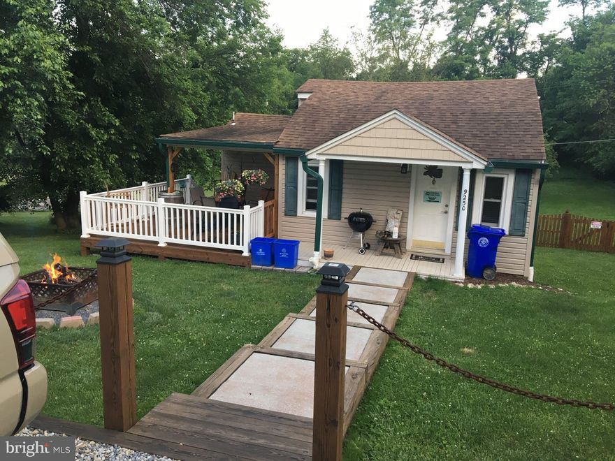 Square footage is incorrect in Tax Record. Above ground is correct at  844 Sq. Ft.  580 Sq. Ft. mostly finished lower level. 18 X 20 Room in lower level has Mini Split HVAC and is mostly finished. This room could be a Family Room, Bed Room, Work Shop or use your imagination. 
Septic system has just been pumped and inspected.
A Cozy 2 Bed Room, 2 Bath single Family Home in a quiet country sitting on 1/2 an Acre with large fenced yard, that is assessable from the front porch. Each Bed Room is on the main level with their own bath. The Vaulted ceilings in the Living Room gives an open feel to the remodeled room. The walkout basement is unfinished with it's own HVAC unit and could be made into a third Bed Room, living space or shop.  The house has central AC and Heat and the HVAC unit is brand new. There are 3 out buildings  the one in frond has electricity. The large backyard is perfect for gardens, play area or your pets .HVAC put in 07/23/16
Pressure tank and well pump 8/15/17
Sump pump 2020, UV unit on water 2021