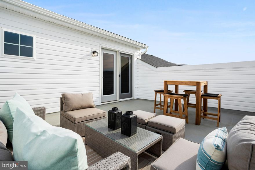 A luxury home with the 4th floor Loft and stunning rooftop terrace. Step into the elegance of the Upton II, a house designed with high-end finishes and refined details. Enjoy the sleek look of stainless-steel appliances, and luxurious quartz countertops, all highlighted by 9-ft ceilings. Relax and enjoy the beautiful views of the Kernstown Battlefield. Unwind on your private back deck or use the spacious 2-car garage for your hobbies. Located just 10 minutes from Old Town Winchester, Lofts at Creekside combines historic charm with modern convenience. Nearby Creekside Station features specialty shops and chic retailers, while easy access to I-81 and Route 7 ensures smooth commuting. Discover the perfect blend of city sophistication and mountainside relaxation *Photos may not be of actual home. Photos may be of a similar home/floorplan if the home is under construction or if this is a base price listing.