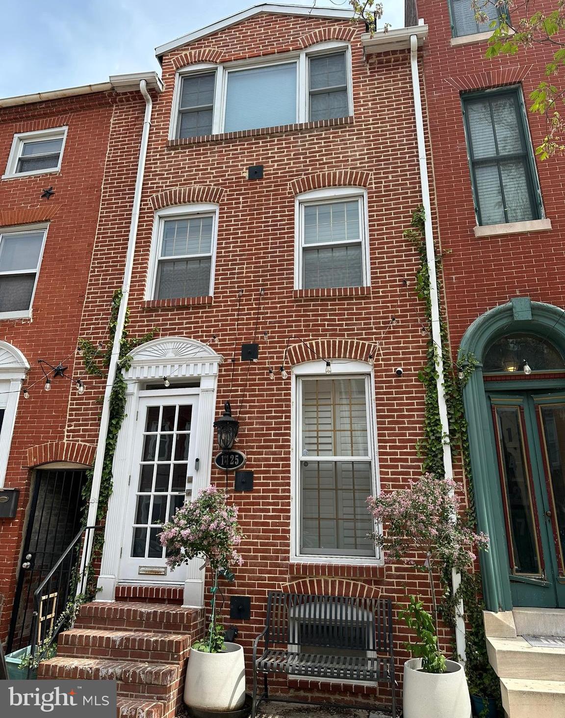 Welcome to 1425 William St, a beautifully updated townhome located in the heart Federal Hill. This impressive 2,300-square-foot residence offers a perfect blend of modern amenities and classic charm featuring 3 spacious bedrooms. The primary bedroom on the 3rd floor creates the feel of private escape. The home also boasts 2.5 bathrooms, with the primary bathroom being quite the luxurious scene. There is 1 bedroom and 1 full bath located on the home's main level. This home is designed to meet all your living needs.
After parking in the garage, tucked in the rear of the home for your convenience, step inside to find a main level ready to entertain friends or enjoy family time. On the second level, you'll find the recently renovated kitchen, boasting sleek countertops and modern appliances, perfect for culinary enthusiasts. Look forward to slow mornings with coffee that you can enjoy on the spacious retreat of the deck.
This townhouse combines luxury, comfort, and functionality, making it a must-see property! Don't miss the opportunity to make this exquisite home your own!