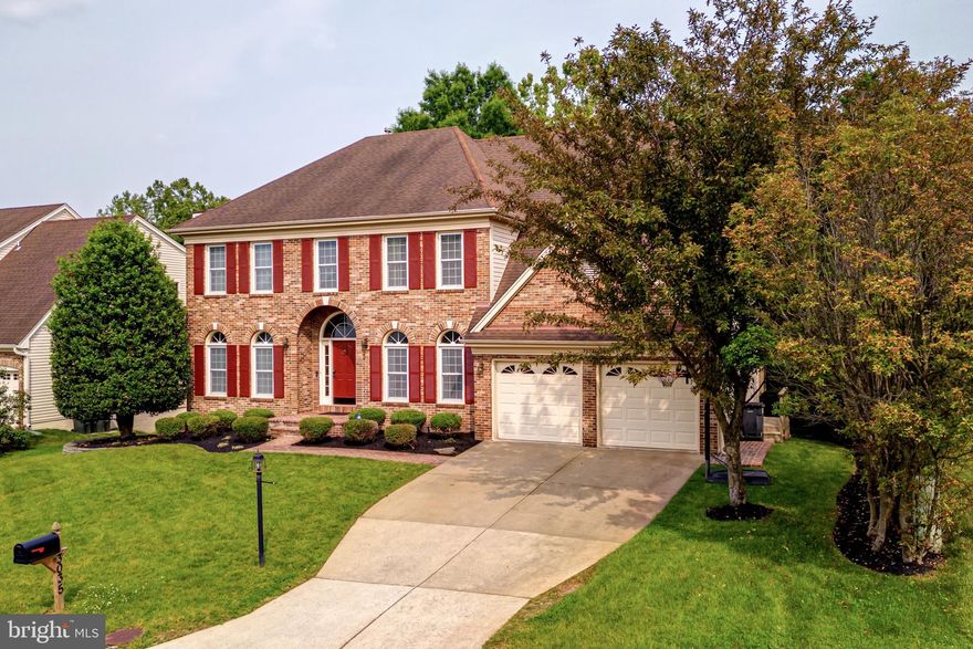 Welcome to this exquisite, updated Colonial in the highly sought-after Chantilly Highlands community.
This remarkable residence boasts stunning Brazilian cherry hardwood floors that flow seamlessly throughout the main level, complemented by elegant oak hardwood flooring on the upper level & low-maintenance laminated hardwood in the lower level. Together, these finishes add a refined touch of elegance & practicality to the home. The main level is highlighted by a grand two-story foyer & two story family room, featuring a beautifully updated brick fireplace adorned w/ intricate trim details.  The living & dining rooms, positioned at the front of the home, are flooded with natural light through an abundance of windows, creating a bright & airy atmosphere throughout. The updated kitchen is a true centerpiece, equipped w/ sleek stainless steel appliances, rich granite countertops, and professionally updated oak cabinetry, enhanced w/ fresh paint and new hardware. A convenient kitchen island and breakfast bar make it ideal for both cooking & casual dining. Adjacent to the kitchen is the laundry area, which opens to a double-door pantry, providing ample storage space & a window that brings in additional natural light. Access to the garage is conveniently located off the rear hall.  The sunroom, with its skylights & multiple windows, extends the living space & offers a seamless connection to the outdoors, filling the home with an abundance of natural light. Just beyond the sunroom is a spacious double deck, perfect for entertaining, w/ stairs that lead down to the rear grounds. A thoughtfully updated half bath is conveniently located off the main foyer for guests. Additionally, a private home office, enclosed by French doors, offers a quiet space for study or work. Built-in cabinetry provides discreet storage & showcases shelves perfect for displaying cherished items. Ascending to the second level, you will be greeted by rich oak hardwood flooring that continues throughout the upper level. The primary suite is a serene retreat, featuring vaulted ceilings, a generous sleeping area, double closets, & a luxurious en suite bath, complete w/ a soaking tub, walk-in shower, & double vanities. Three additional well-appointed bedrooms on this level share a fully renovated bath, featuring double vanities, a walk-in shower. The lower level is equally impressive, w/ an open railing design on the staircase that enhances the home’s contemporary feel. This space is anchored by a second brick fireplace & a spacious recreation room, perfect for television viewing or creating distinct areas for activities such as ping-pong or exercise. Two additional unfinished storage rooms provide ample space for all your organizational needs. An updated full bath serves this level, and the lower level walks out to a private deck, offering direct access to the beautifully landscaped backyard. Situated in the coveted Chantilly Highlands neighborhood, this home offers access to local parks, scenic trails, a community swimming pool, tennis, & top-rated schools. With convenient access to commuter routes, healthcare facilities, shopping, dining, and more, this residence provides the perfect blend of elegance & convenience. Updates:
Fresh Paint Throughout much of the home,Stainless-Steel Appliances: dishwasher, refrigerator & microwave are all 2-3 years old,Stainless Steel Microwave-less than 12 months old,Staircase carpeting 2 years old,Updated lighting throughout,Updated mirrors, lighting & faucets in all baths
Renovated upper hall bath,Built in cabinets/wardrobes in 2 upper bedrooms & garage
Family room built-in  cabinetry for a TV,Hot water heater 9 years old,Dryer 3 years old,Oak hardwood flooring installed in the upper level,Wide plank Laminate wood flooring installed in the lower level
Roof was replaced prior to the owners purchasing the home 10 years ago