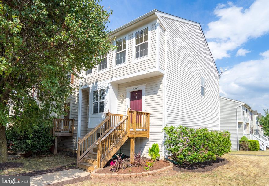 Welcome to pristine condition End unit townhouse in heart of Gainesville. This home offers Plenty of nature light. Spacious Main and upper levels offer hardwood through out. Kitchen has stainless appliances and new granite counter top overlooks to breakfast area. Hardwood floor leads to upstairs.  Vaulted ceiling primary bedroom with walk in closet and shower and soak in tub in the bathroom. Walkout basement has a bedroom and a full bathroom. Basement Kitchenette full size refrigerator conveys. Walkout back entrance has privacy fenced in backyard. HVAC and heating system only about 5 years old. Community pool, basketball court and tennis court. It is close to Harris teeter shopping center and Virginia gateway that offers so many restaurant, target, shops, and movie theater.  Welcome home!