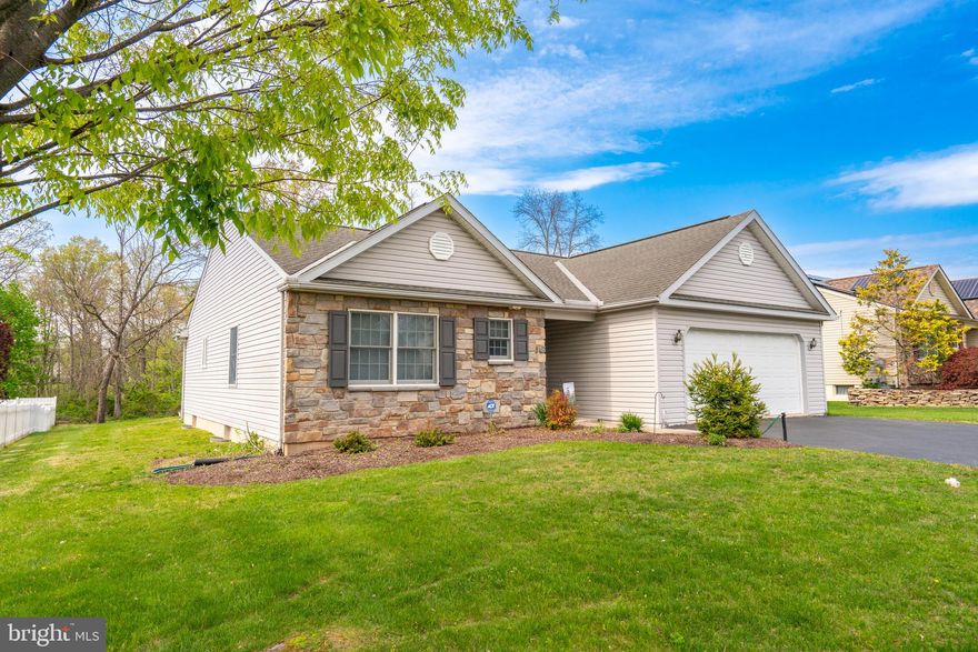 Welcome to this meticulously maintained 3-bedroom, 2 full bath ranch located in the heart of Pennsburg, offering the ease of one-floor living with a layout that is both spacious and functional. A welcoming foyer leads into the main living area, where vaulted ceilings, skylights, and a gas fireplace create a bright and inviting space. The kitchen is complemented by a generously sized dining area, providing plenty of room for everyday living and entertaining, with direct access to the rear deck. The primary suite offers a large bedroom, multiple closets, and a well-appointed private bath featuring a walk-in shower and heat lamp for added comfort. Two additional bedrooms are both well-sized, including one with a walk-in closet, and are served by a second full bath with a tub/shower combination. Designed for convenience, the home offers true main-level living with a spacious laundry room complete with utility sink and an oversized attached two-car garage with side entry access. The full basement presents an excellent opportunity to expand the living space while still maintaining ample storage. Outdoor living is easy to enjoy with a large deck overlooking a flat backyard with a storage shed, all set against a tree-lined backdrop that provides a sense of privacy. With no HOA, the property offers flexibility and ease of ownership. Additional features include Anderson tilt-in windows throughout, top-down, bottom-up window treatments, and a heating and cooling system replaced in 2018 with transferable warranty and recent servicing. A well-cared-for home offering comfort, functionality, and a convenient Pennsburg location. Schedule your private showing.