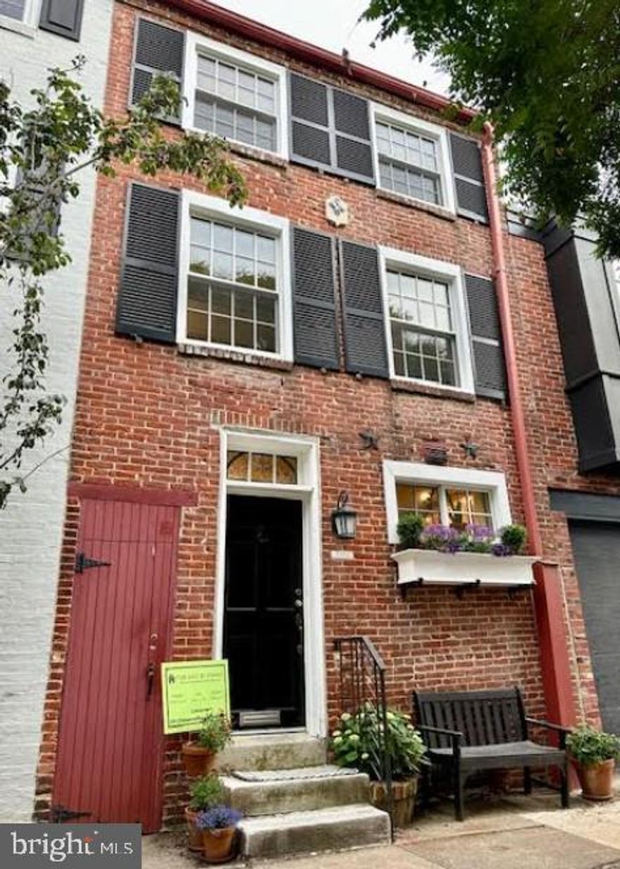 Charming brick three-bedroom home (1,289 sq ft) with private garden and alley located in the coveted Fitler Square neighborhood on Delancey Street, less than one block from Schuylkill River Park/Trail and Markward Playground, and two blocks from Filter Square within the Greenfield Albert M School neighborhood zone.

The first floor offers both a living and dining space that includes a renovated wood burning fireplace, located conveniently next to the kitchen with robust cabinet storage. The second floor includes two bedrooms and a full bath. The primary bedroom has a custom walk-in closet, while a second spacious closet is located in the hallway. The third floor offers a third bedroom and two additional closets for storage. 

Listed with HomeRise.

The tiered garden with brick patio offers the perfect opportunity for personalized outdoor living. The private breezeway. that runs the length of the home, provides a protected space for outdoor storage with easy access to the front and back of the home.

The home was recently updated to include central air conditioning and heating. Additional recent updates include new windows, silver coated the roof, refinished wood floors, new refrigerator, and lateral sewer line with new curb trap.

An unfinished basement (142 sq ft), with washer/dryer, provides ample space for storage and potential for another level. An unfinished attic space is also available. The generous 840 sq ft lot offers an opportunity to expand the home.

The home is conveniently located 0.6 mi from Rittenhouse Square, 0.7 mi from 30th Street Station, and 1.2 mi from University City, with easy access to I-76 (0.9 mi).